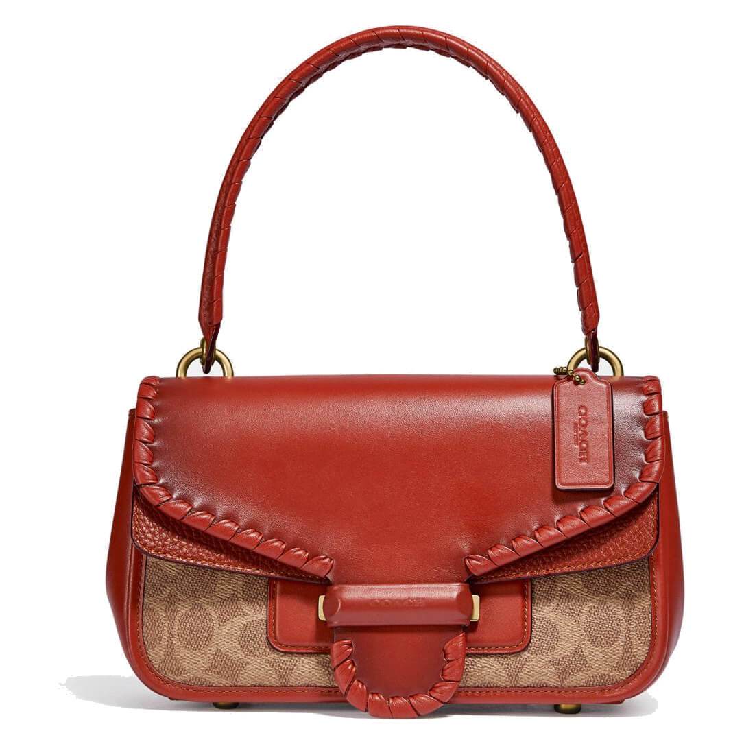 Coach Ladies Cody Leather Shoulder Bag in Tan Rust with whipstitch detailing, showcasing signature canvas and leather materials.