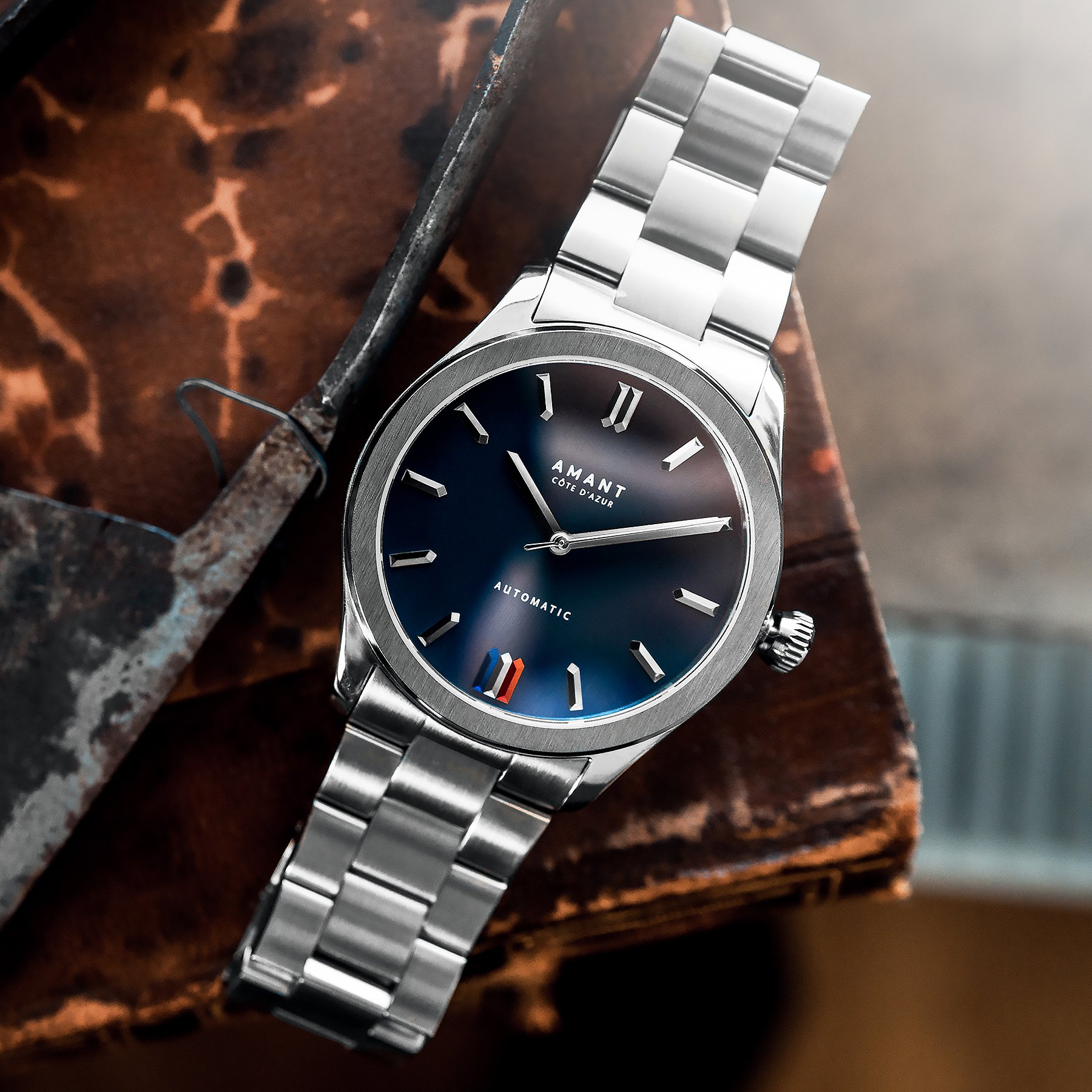 Côte d'Azur limited edition explorer watch showcasing bayonet hands and Tricolore tribute.