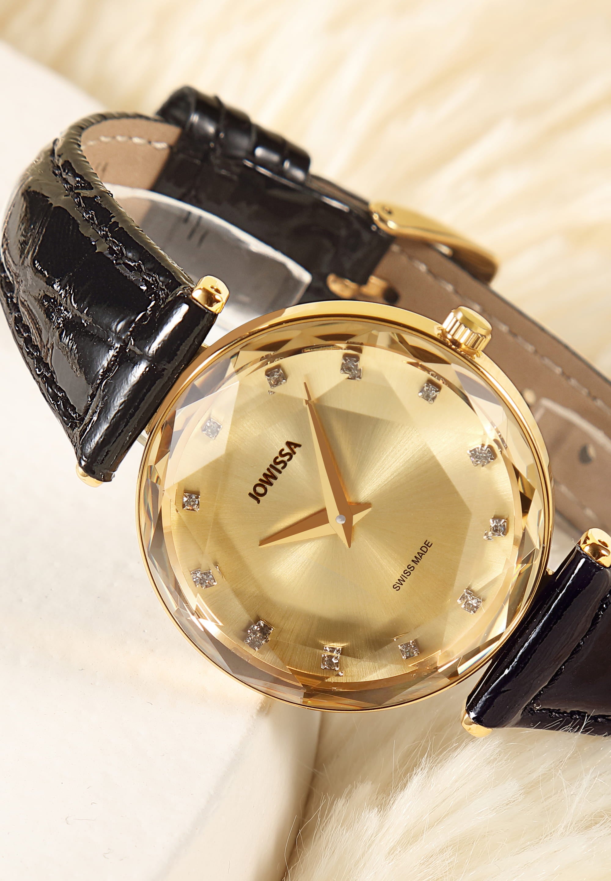 Facet Brilliant Swiss Ladies Watch J5.751.M featuring a Champagne dial, black leather strap, and gold accents, showcasing elegance and luxury.