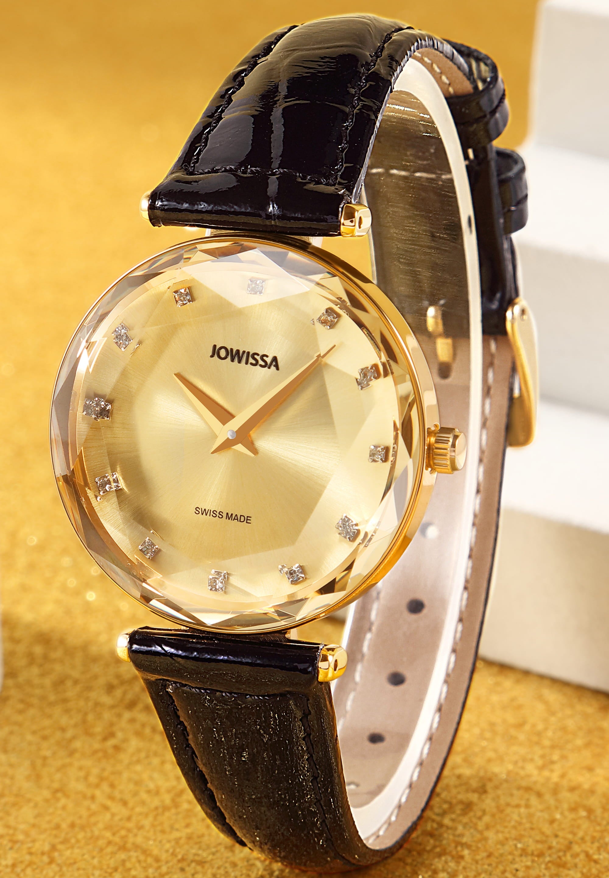 Facet Brilliant Swiss Ladies Watch J5.751.M featuring a Champagne dial, black leather strap, and gold accents, showcasing elegance and luxury.