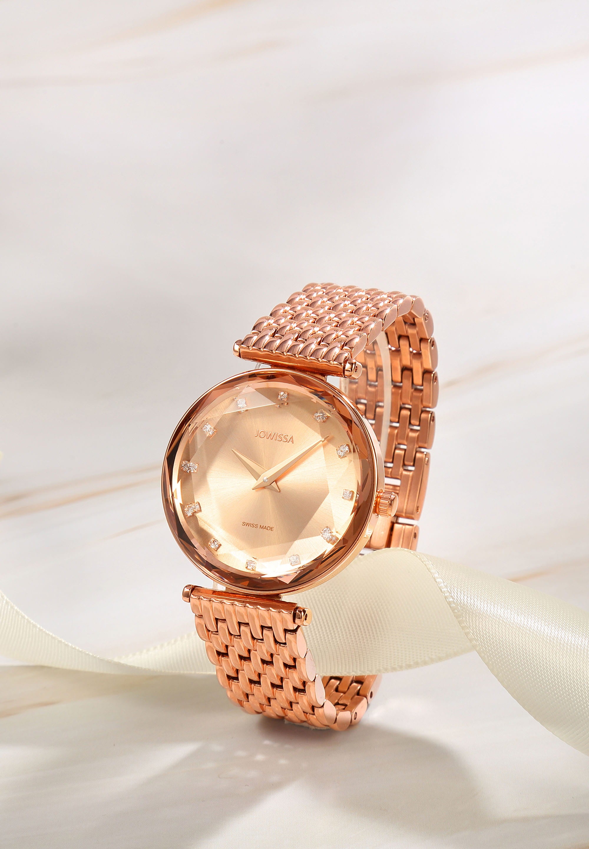 Facet Brilliant Swiss Ladies Watch J5.761.M featuring a rose gold design, sparkling rhinestones, and a stainless steel bracelet.