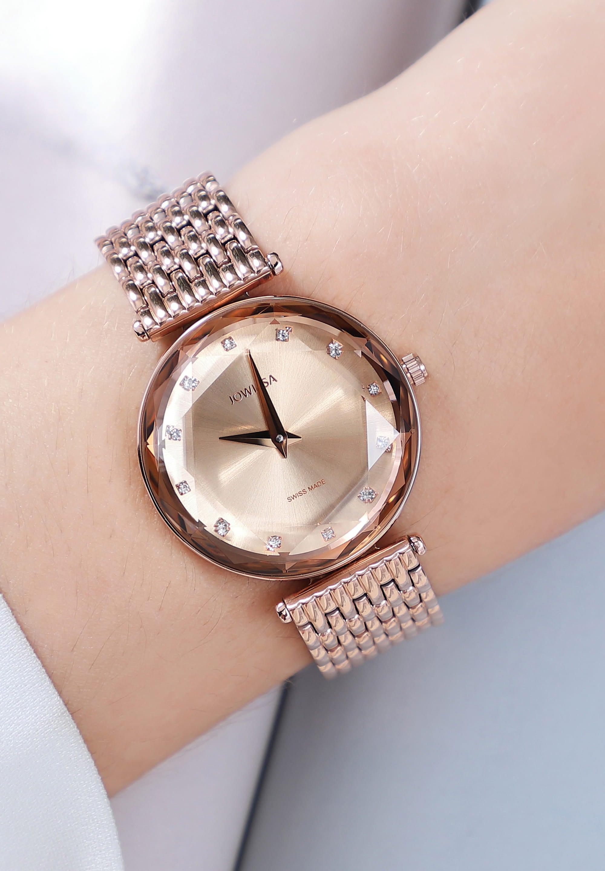 Facet Brilliant Swiss Ladies Watch J5.761.M featuring a rose gold design, sparkling rhinestones, and a stainless steel bracelet.