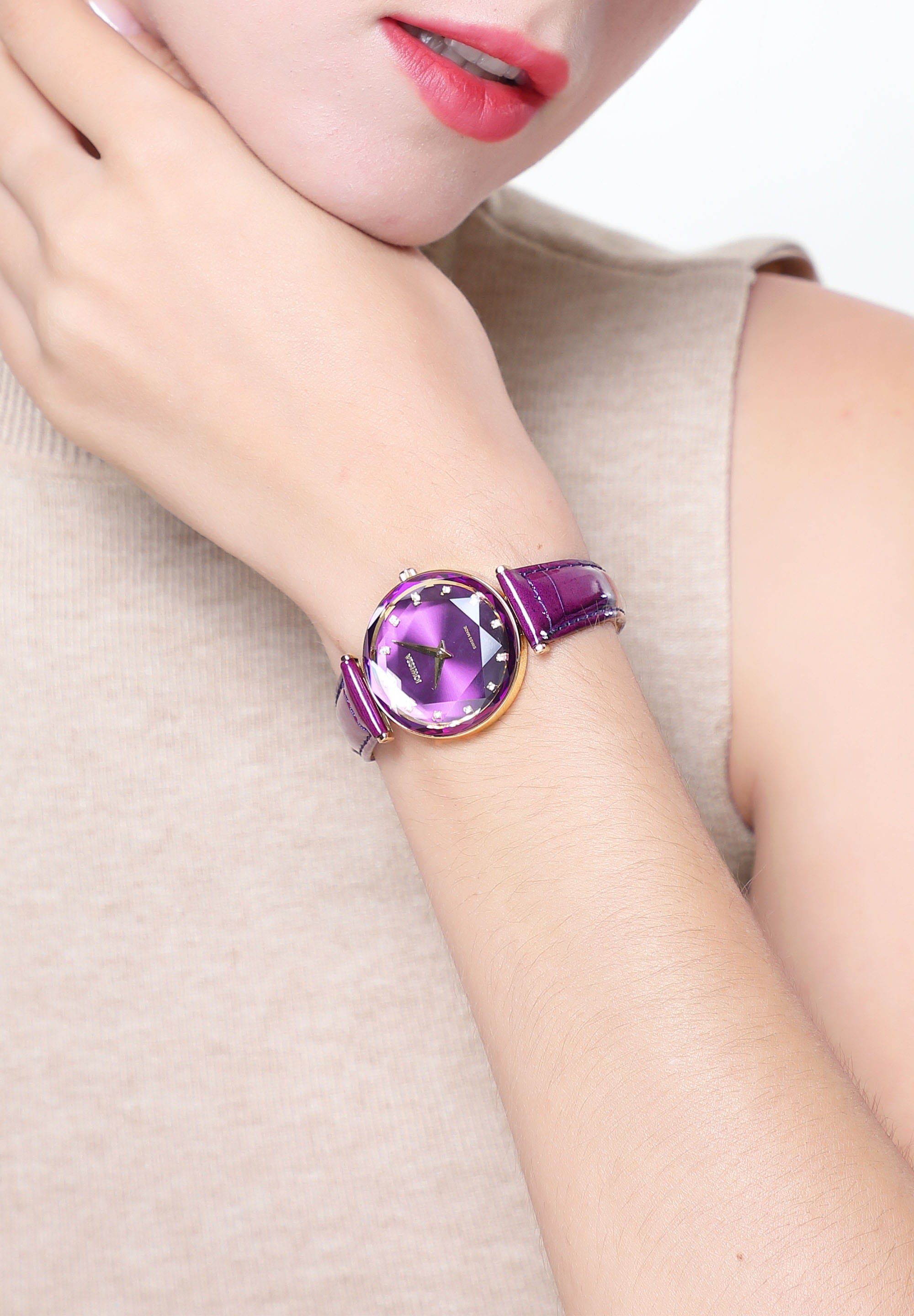 Facet Brilliant Swiss Ladies Watch J5.831.M with purple leather strap and sparkling rhinestones on the dial, showcasing elegant design and Swiss craftsmanship.