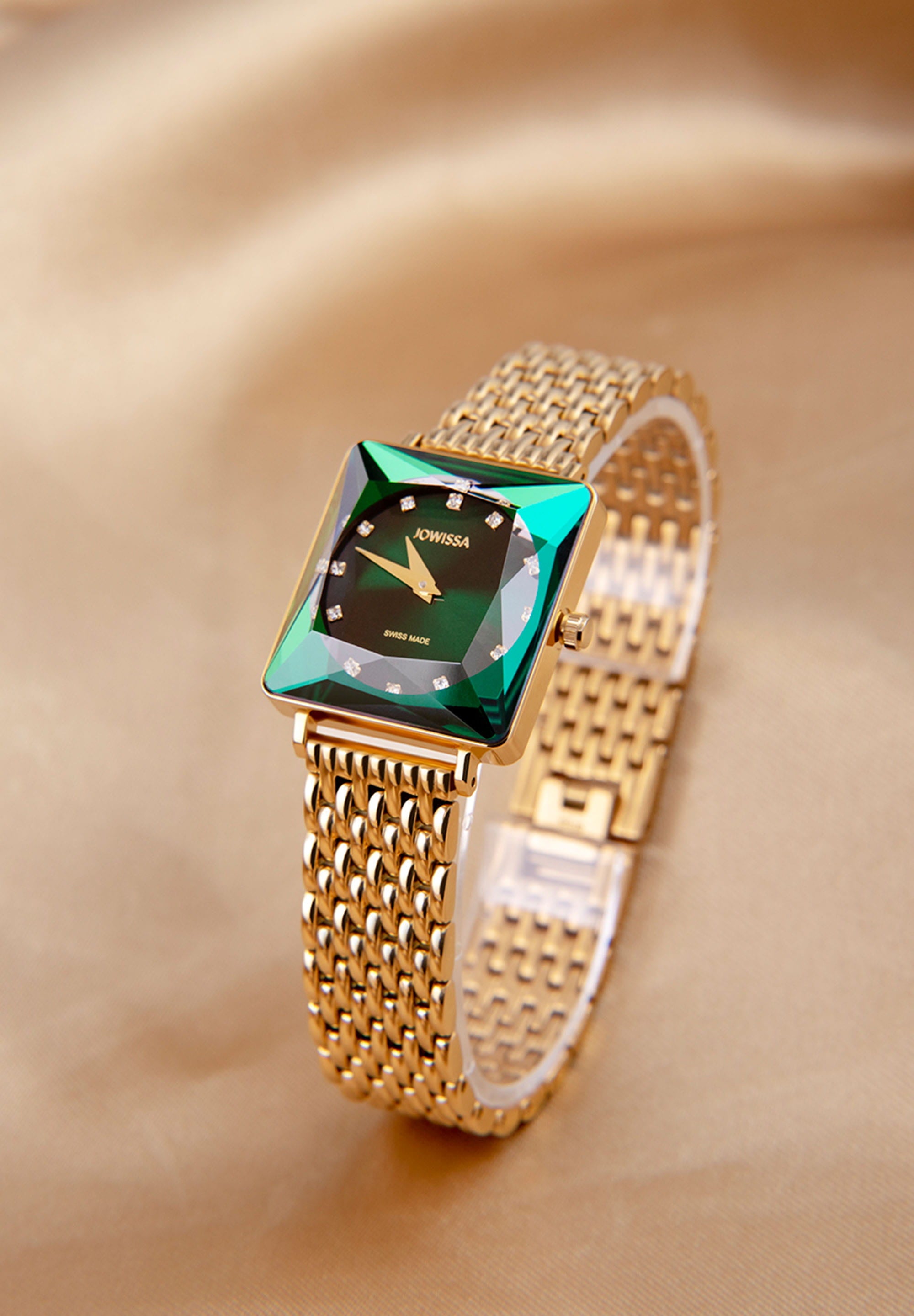 Facet Princess Swiss Ladies Watch J8.067.M featuring a green dial, gold bracelet, and Princess cut crystal, showcasing luxury and elegance.