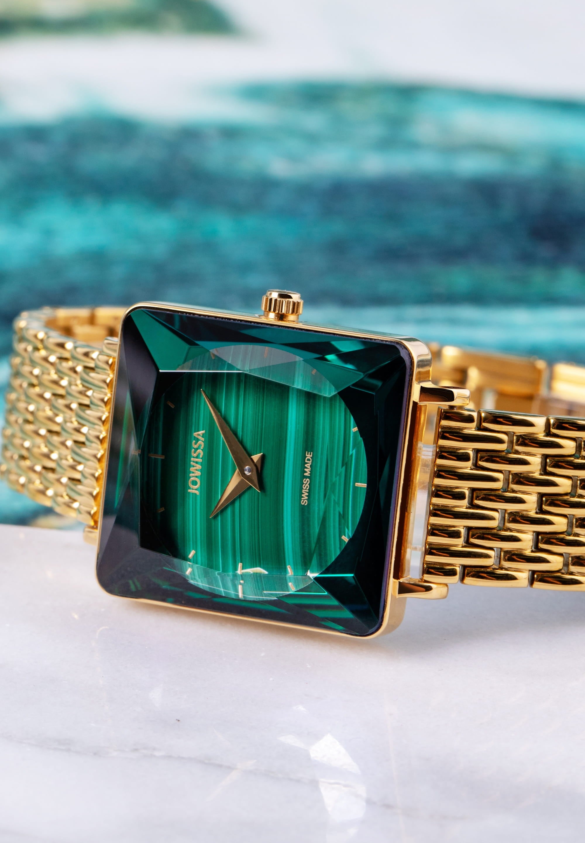 Facet Princess Swiss Ladies Watch J8.774.M featuring a malachite dial and gold-tone bracelet, showcasing elegance and luxury.