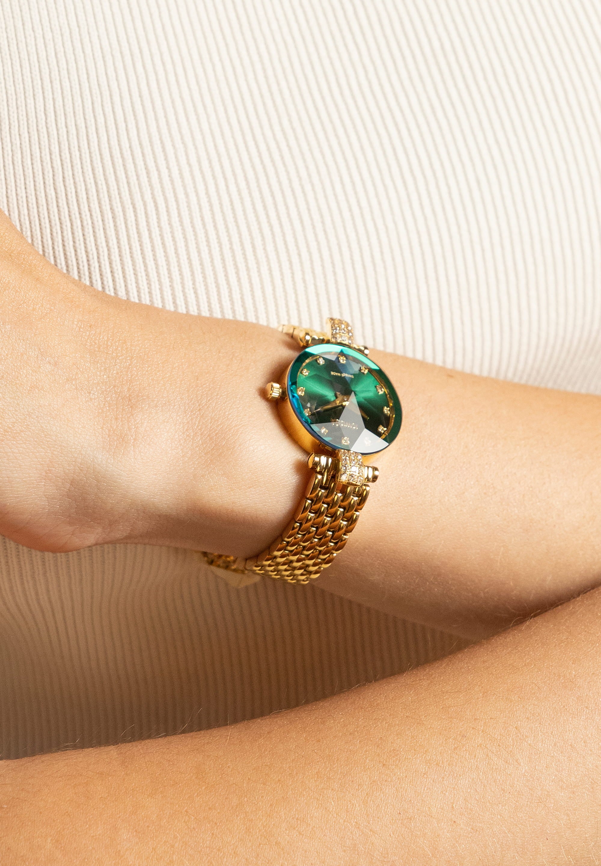 Facet Strass Swiss Ladies Watch J5.497.S featuring emerald green sunray dial and gold mesh bracelet.