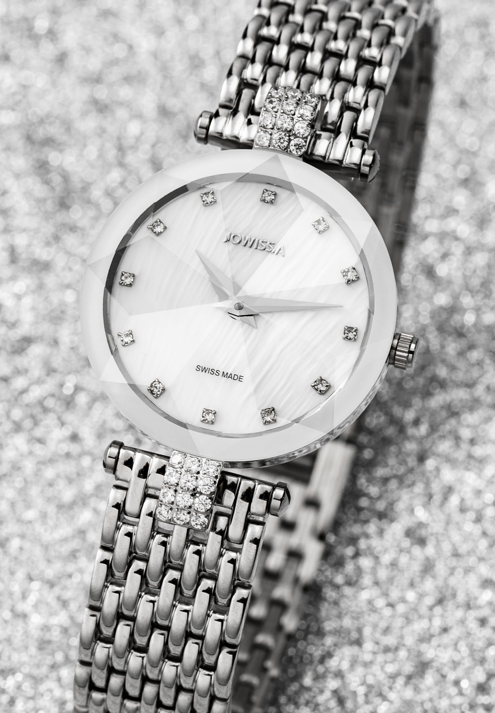 Facet Strass Swiss Ladies Watch J5.636.M featuring a mother-of-pearl dial, rhinestones, and a silver mesh band, showcasing elegance and luxury.