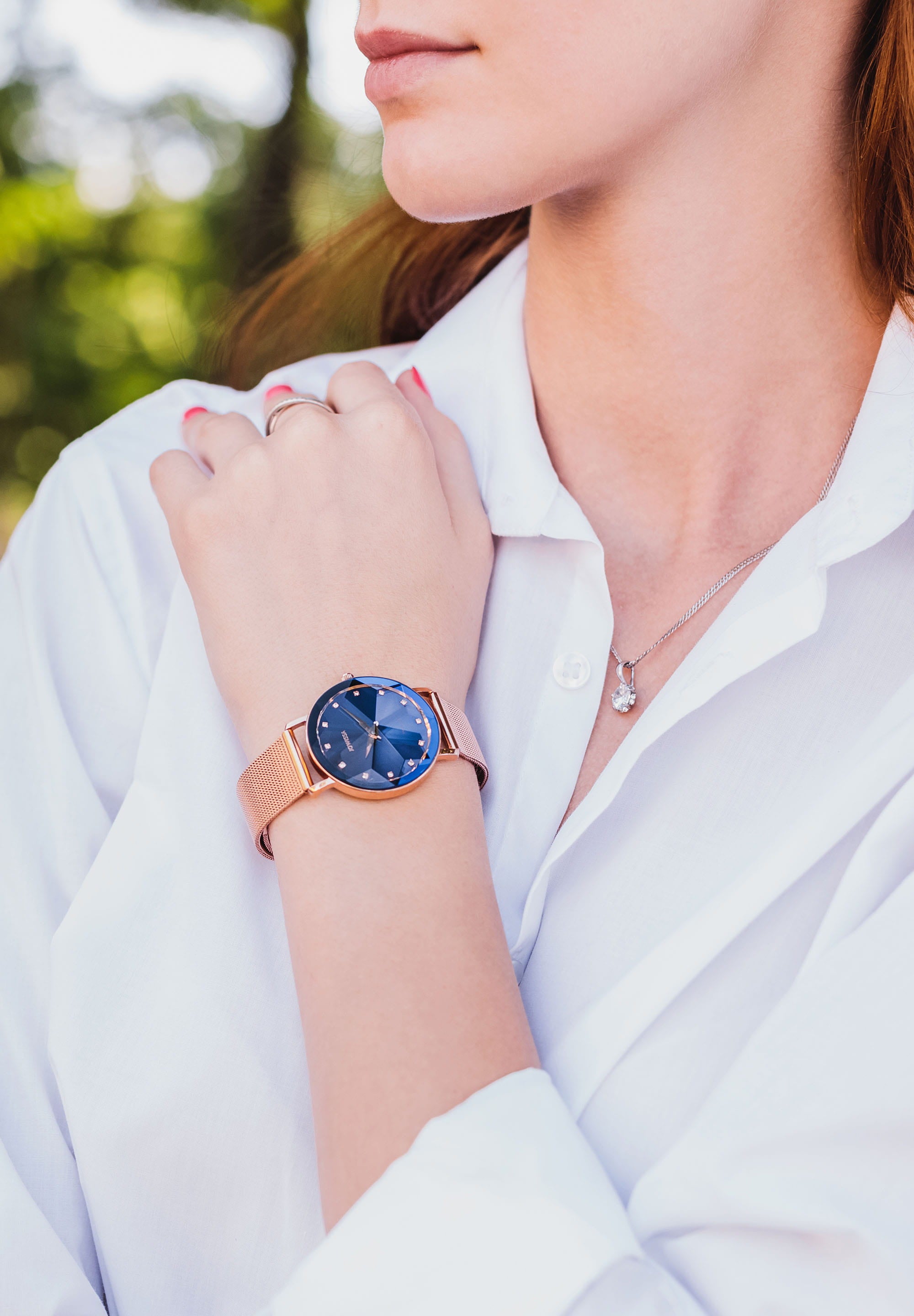 Facet Swiss Ladies Watch J5.613.L featuring a blue sunray dial, diamond-cut crystal, and rose-gold stainless steel mesh band.