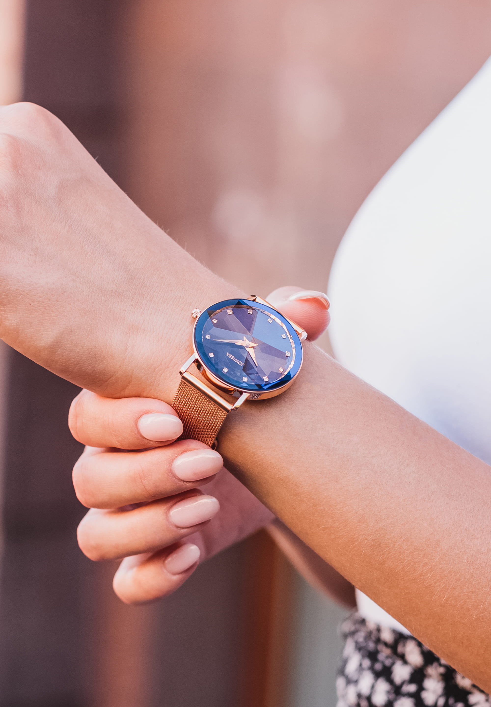 Facet Swiss Ladies Watch J5.613.L featuring a blue sunray dial, diamond-cut crystal, and rose-gold stainless steel mesh band.