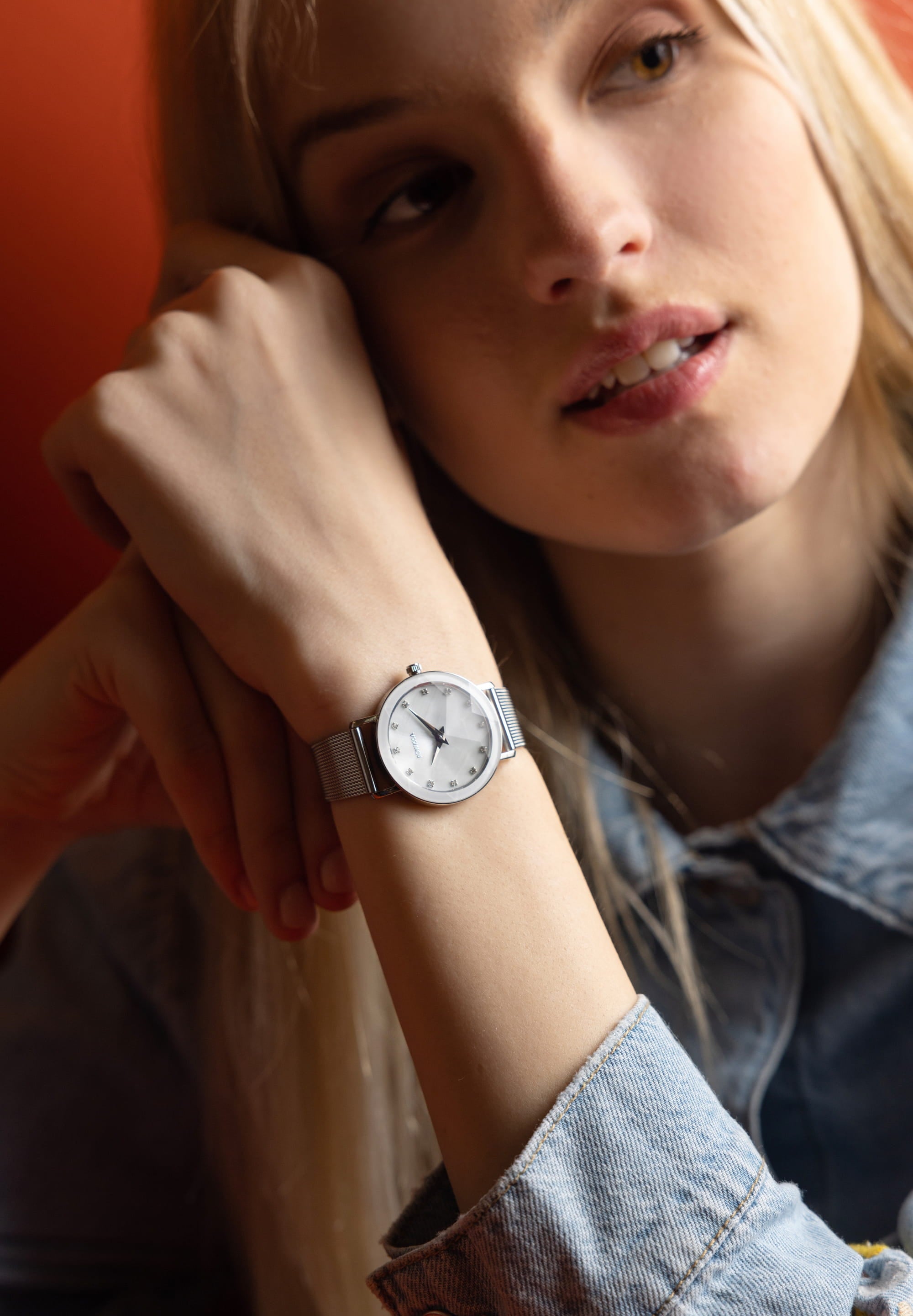 Facet Swiss Ladies Watch J5.668.M featuring a white mother-of-pearl dial, rhinestones, and a silver mesh bracelet.