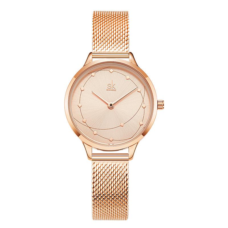 A stylish Fashion Dial Quartz Watch for women featuring a round dial, stainless steel strap, and a sleek design suitable for daily wear.