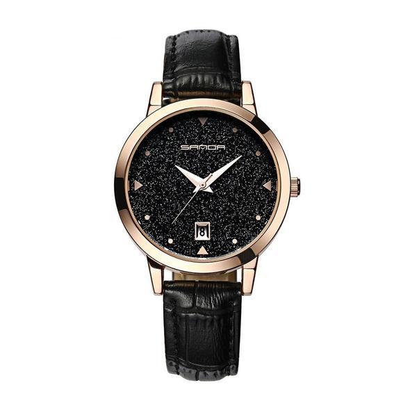 Fashionable female quartz watch with a leather strap, featuring a stylish dial and durable design.