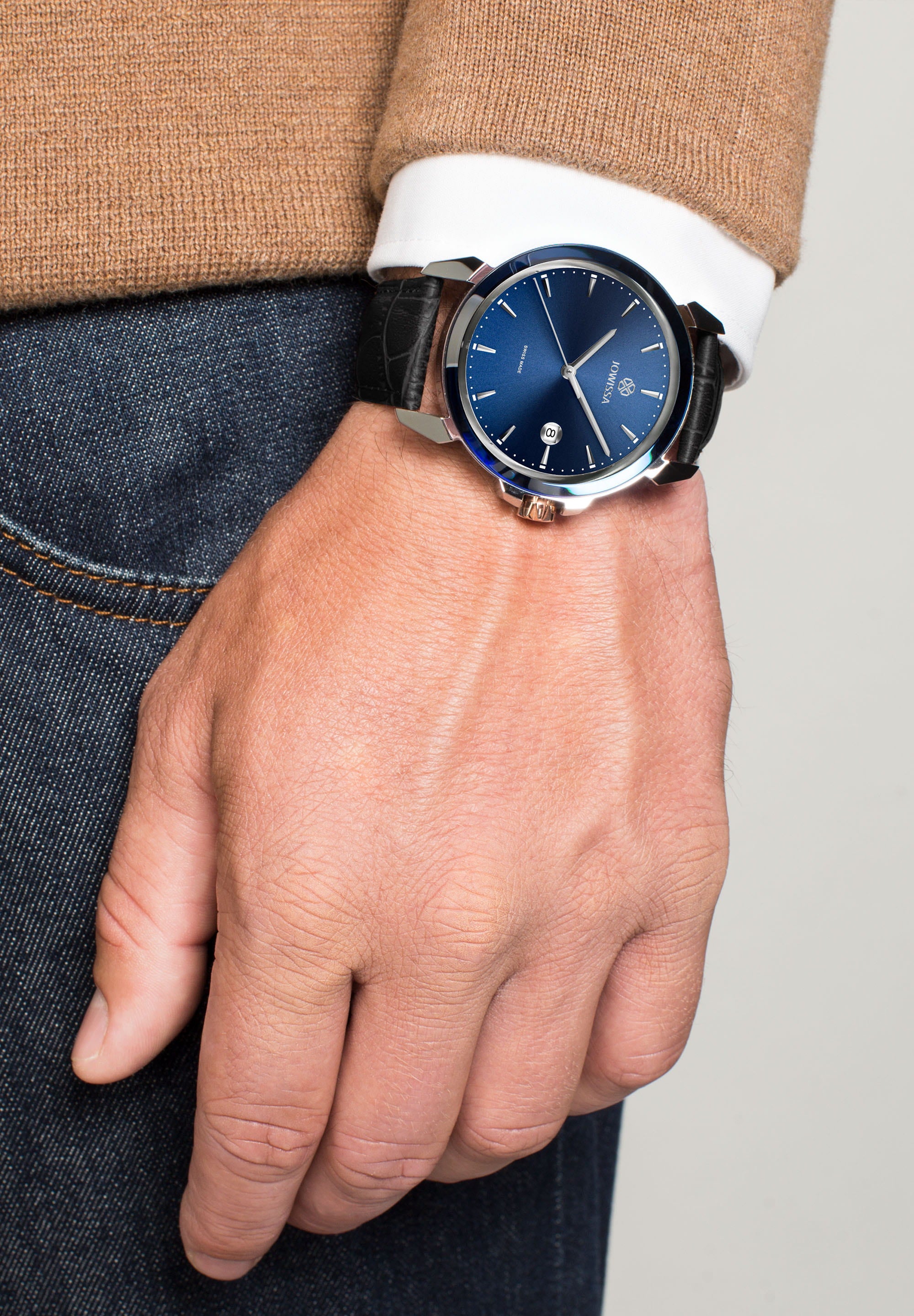 LeWy 3 Swiss Men's Watch J4.242.L with blue dial and black leather strap, showcasing its elegant design and features.