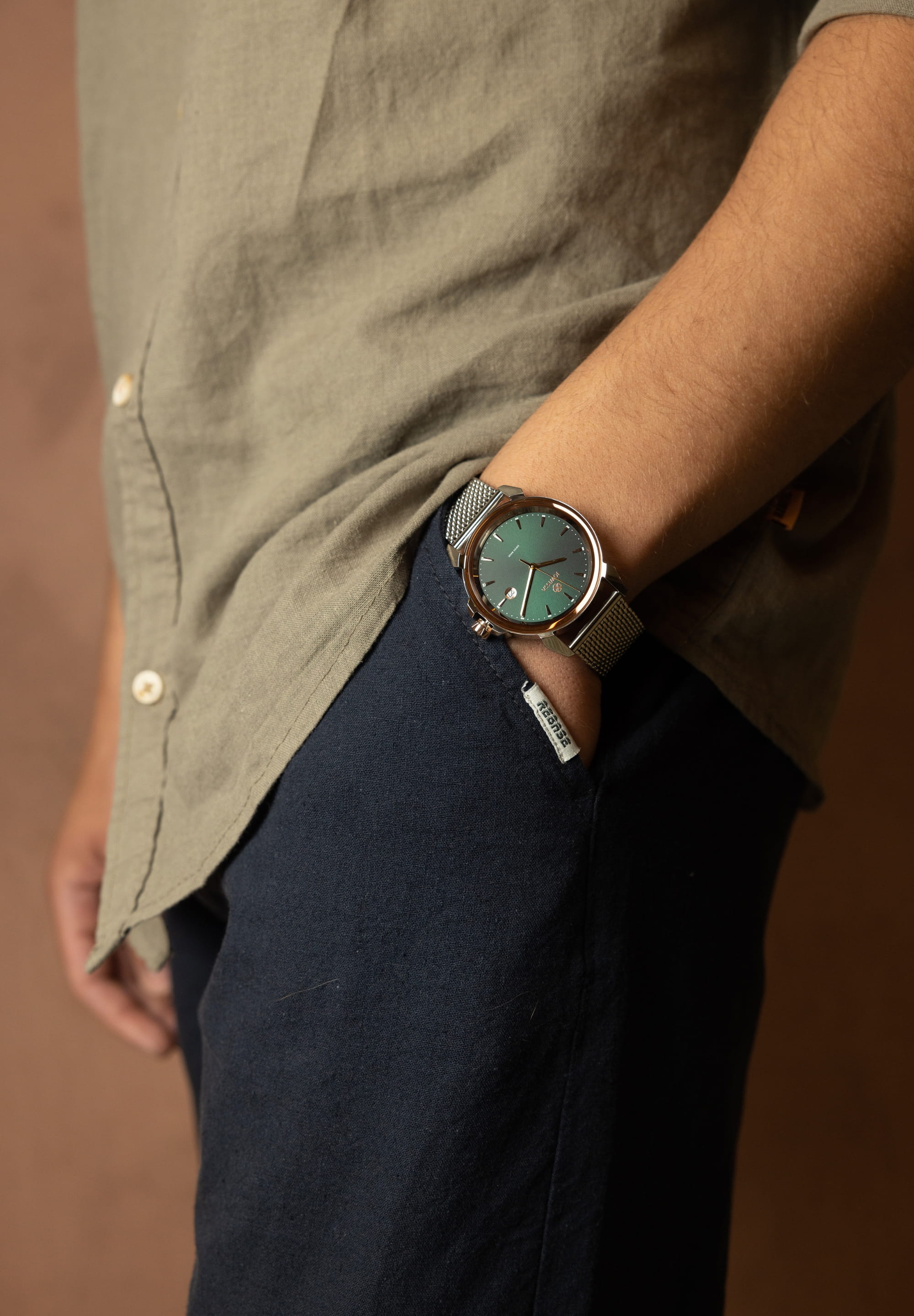 LeWy 3 Swiss Men's Watch J4.467.L featuring a green dial, rose-gold details, and a stainless steel mesh band.