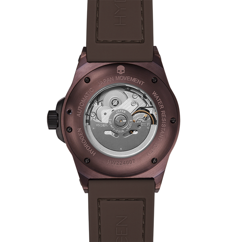 Otto All Brown watch featuring oversized dial with brown lower dial and rose gold accents, complemented by a black carbon fiber and brown silicone strap.