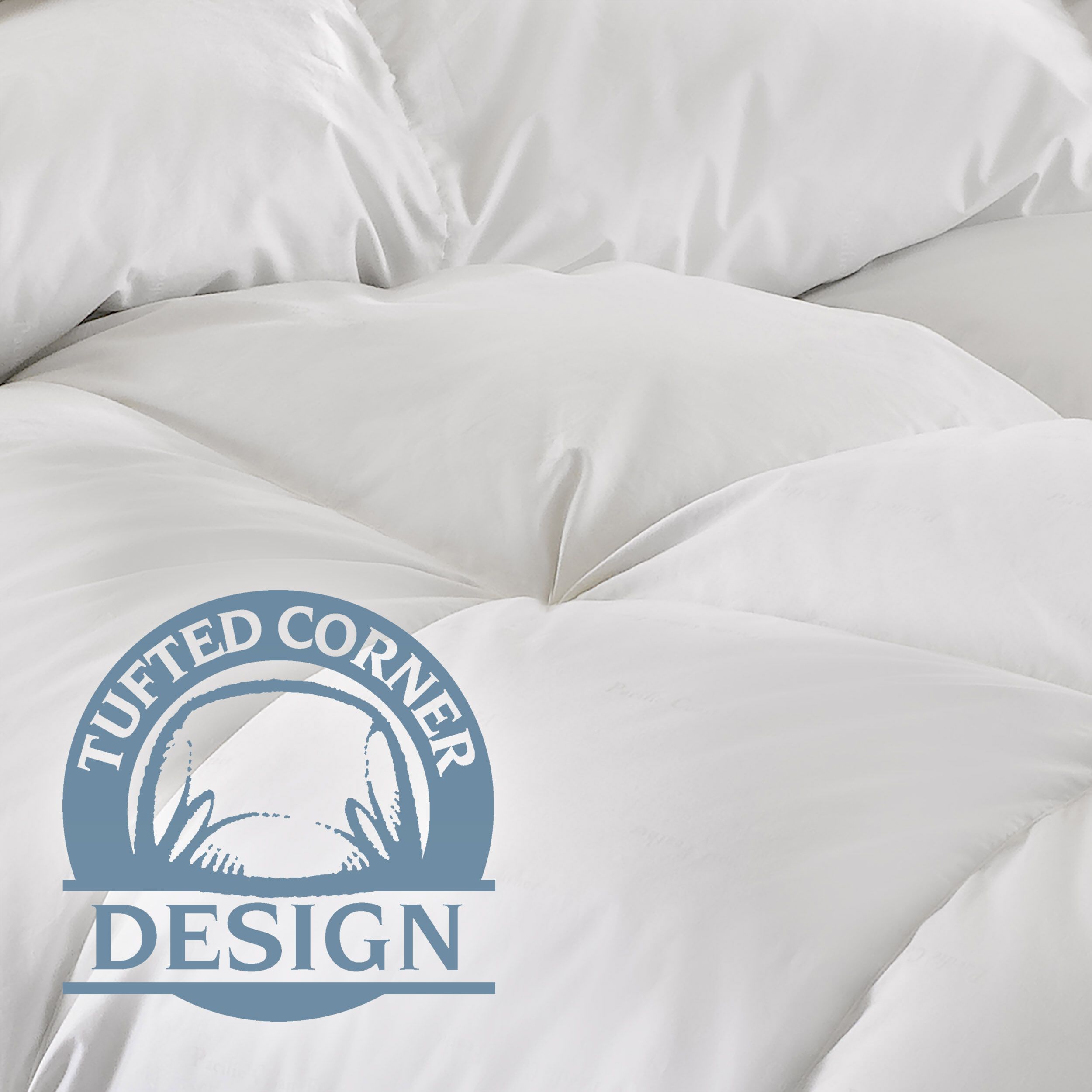 Tufted corner white comforter.