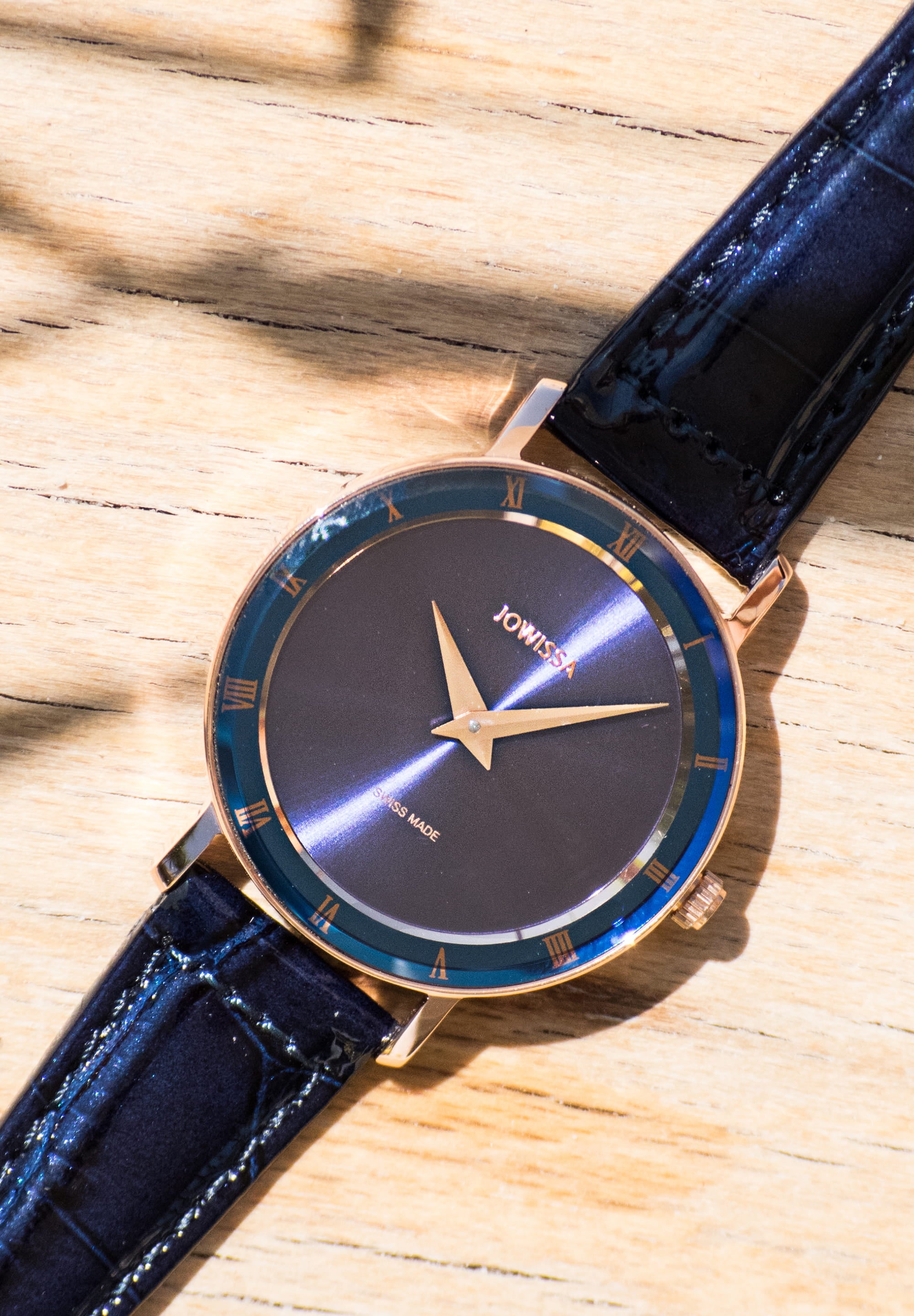 Roma Swiss Ladies Watch J2.313.M featuring a navy blue dial, gold accents, and a glossy alligator-embossed leather strap.