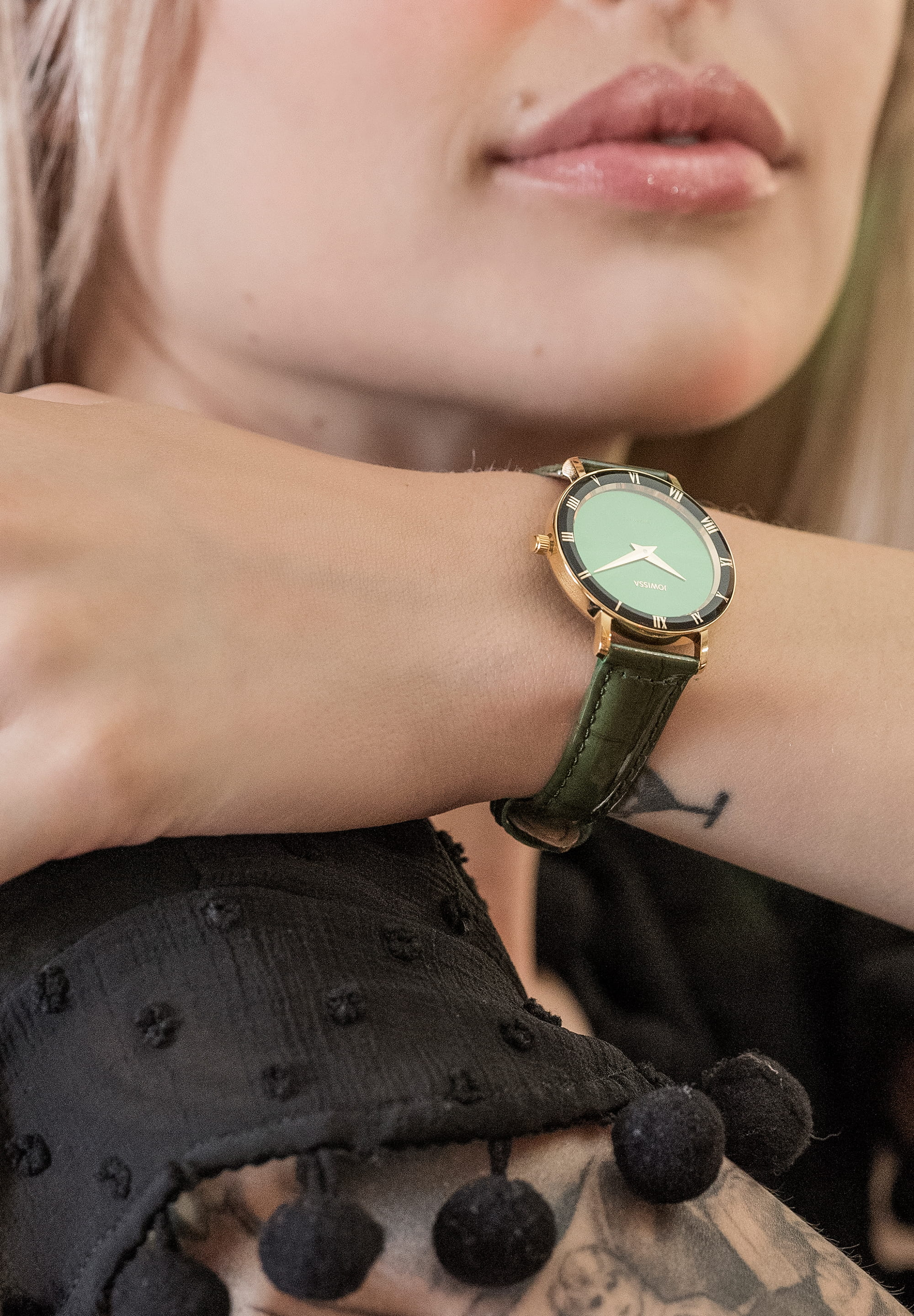 Roma Swiss Ladies Watch J2.273.M featuring an emerald-green dial, gold-tone Roman numerals, and a glossy green leather strap.