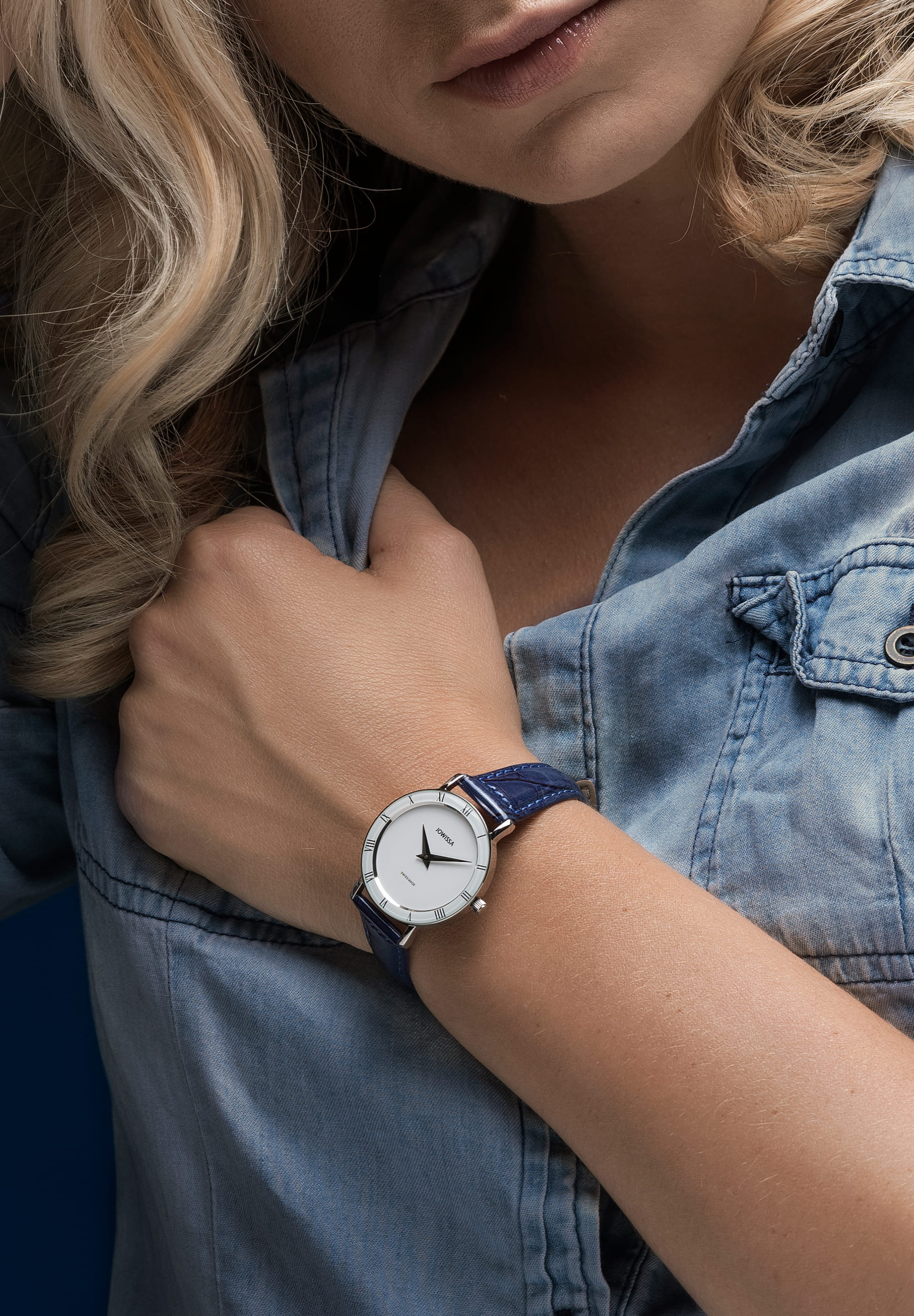 Roma Swiss Ladies Watch J2.275.M featuring a blue leather strap, white dial, and Roman numerals, showcasing elegant Swiss craftsmanship.