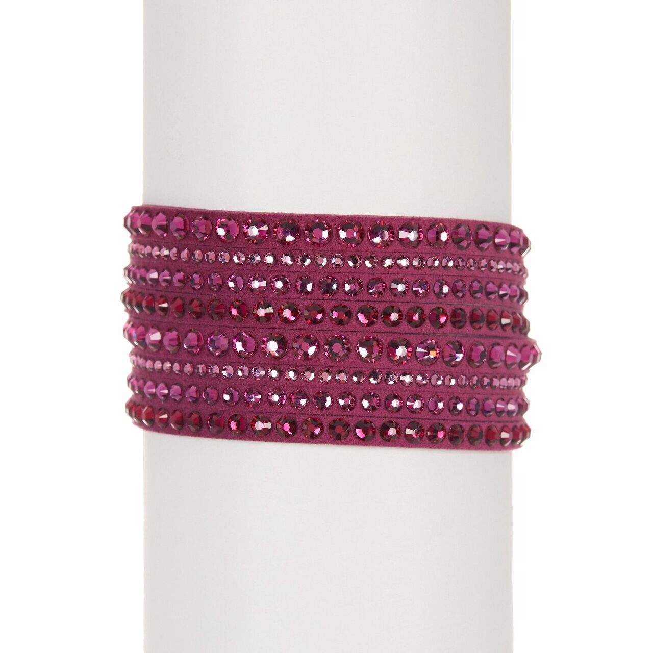 Swarovski 5124127 Slake Fuchsia Alcantara bracelet with cubic zirconia crystals, showcasing a twisted design and adjustable crystal button closure.