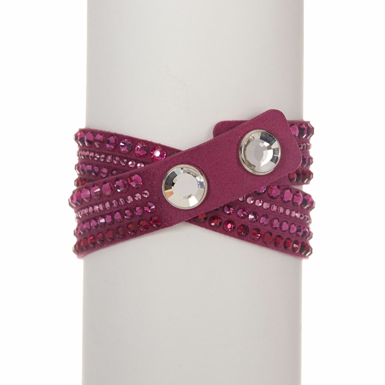 Swarovski 5124127 Slake Fuchsia Alcantara bracelet with cubic zirconia crystals, showcasing a twisted design and adjustable crystal button closure.