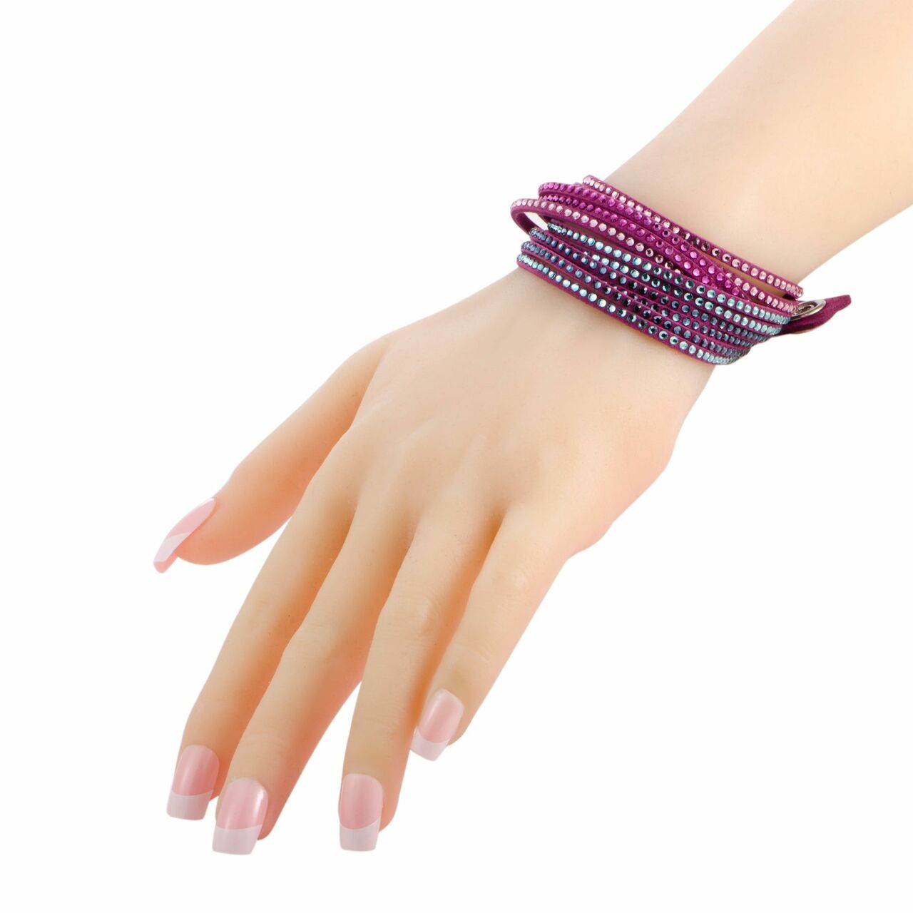 Swarovski 5202465 Slake 2 in 1 Fuchsia Alcantara Fabric Bracelet featuring vibrant fuchsia and blue tones with sparkling crystals.