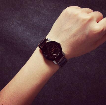 Wristwatch on a person's wrist.