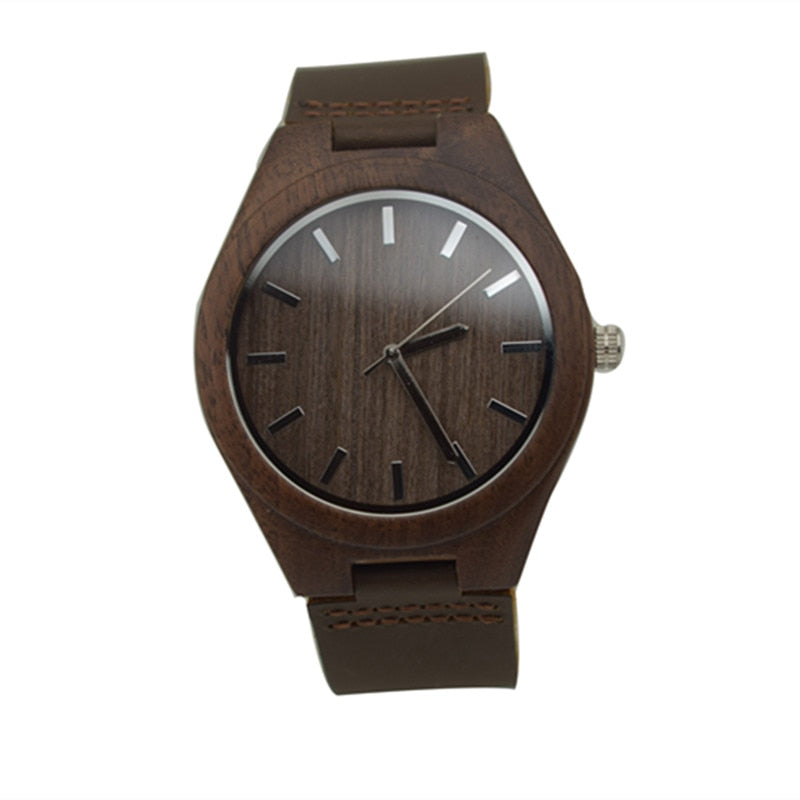 Walnut wooden wrist watch featuring a round dial and leather strap, showcasing its elegant design and craftsmanship.