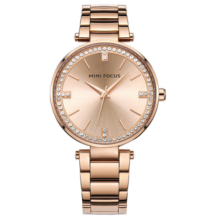 A stylish Women's Quartz Diamond Movement Calendar Waterproof Watch featuring a round dial, stainless steel strap, and diamond accents.