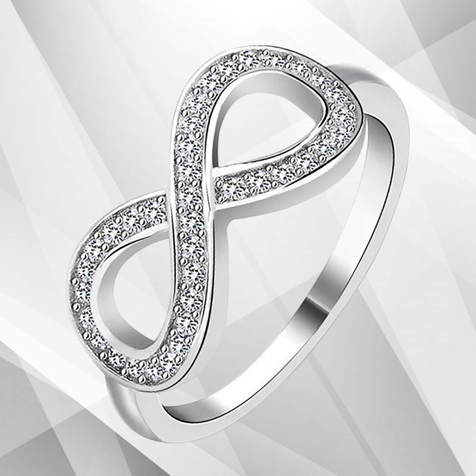 0.35Ct Round-Cut Infinity Engagement Ring featuring 30 top CZ diamonds set in 18K white gold, showcasing a stunning micro pave design.