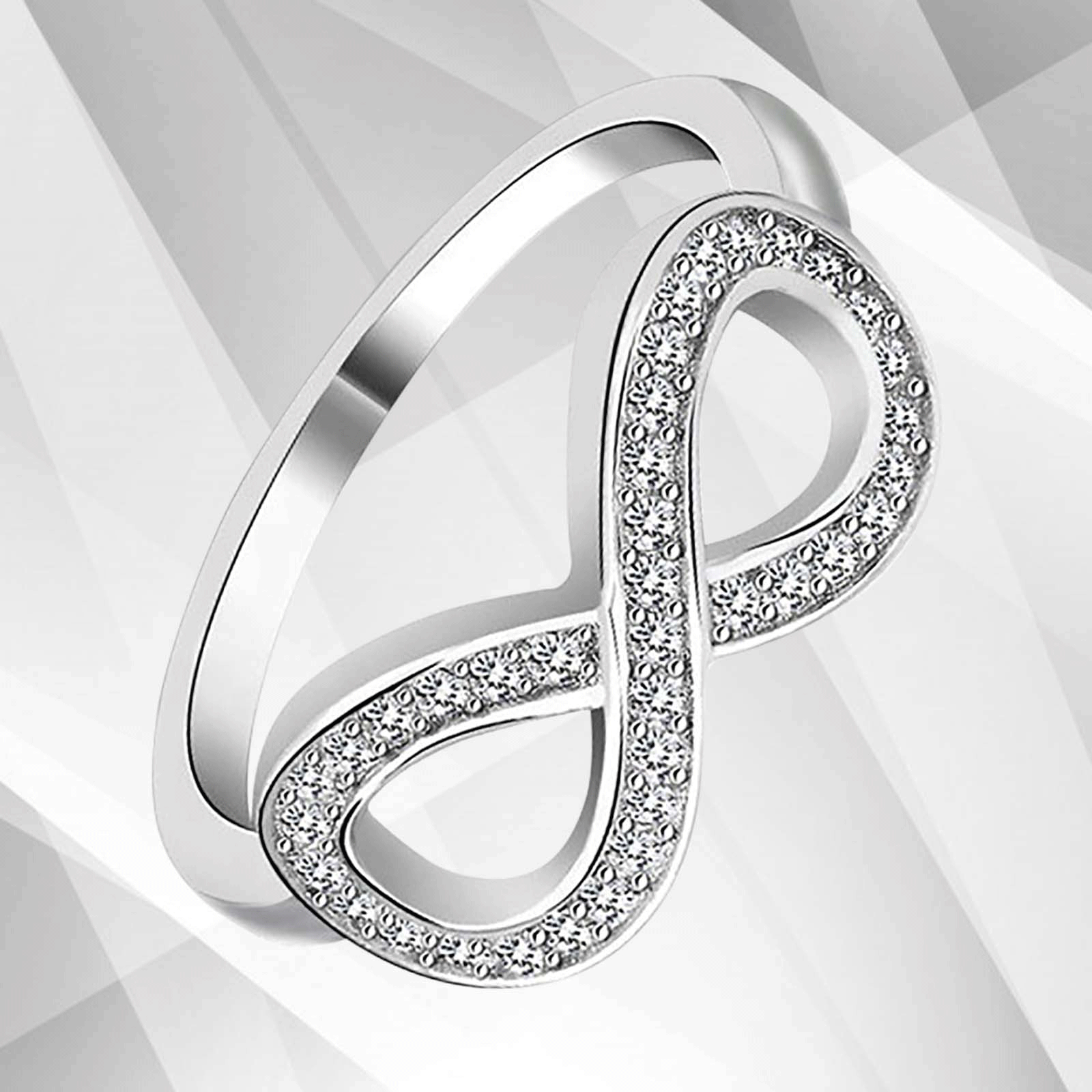 0.35Ct Round-Cut Infinity Engagement Ring featuring 30 top CZ diamonds set in 18K white gold, showcasing a stunning micro pave design.