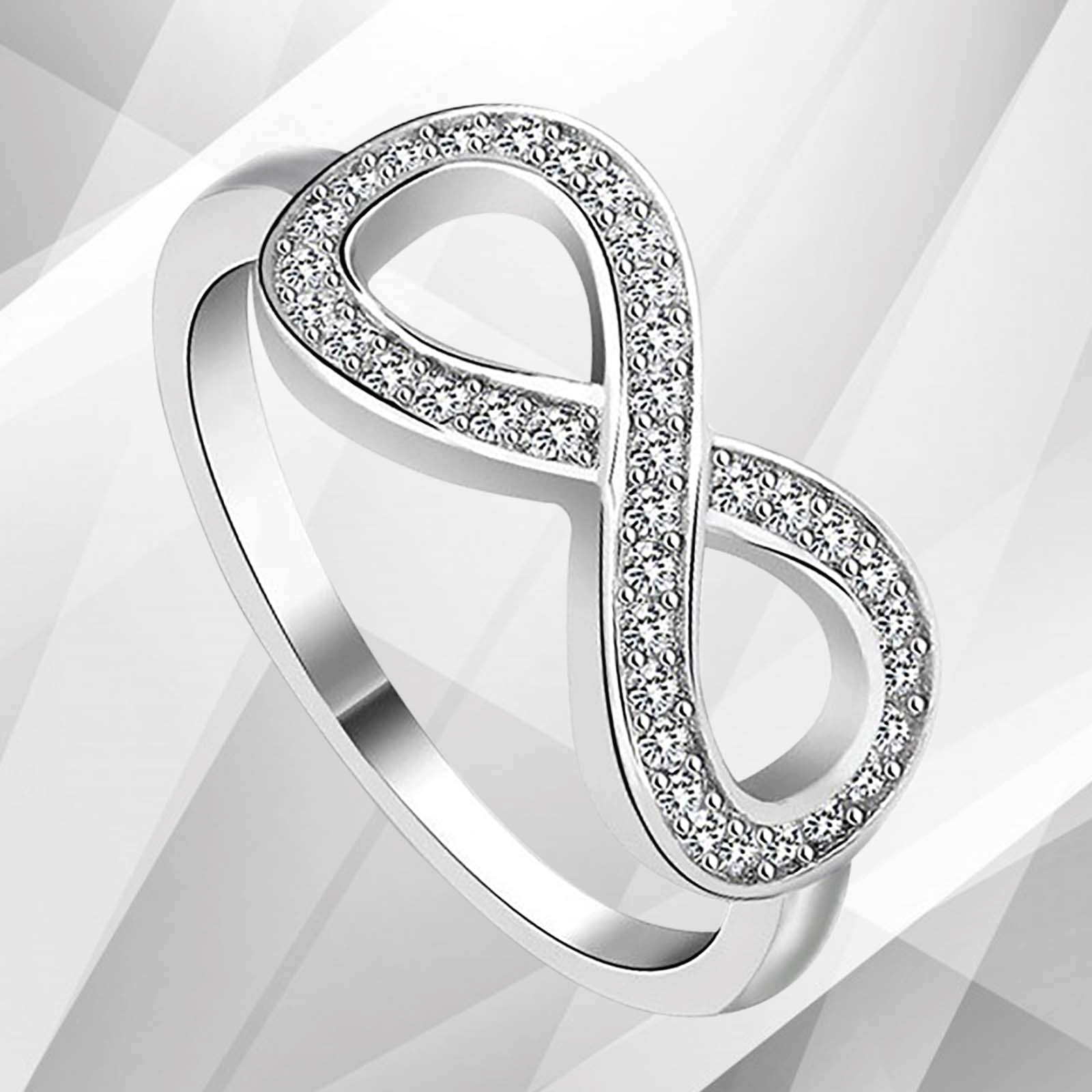 0.35Ct Round-Cut Infinity Engagement Ring featuring 30 top CZ diamonds set in 18K white gold, showcasing a stunning micro pave design.