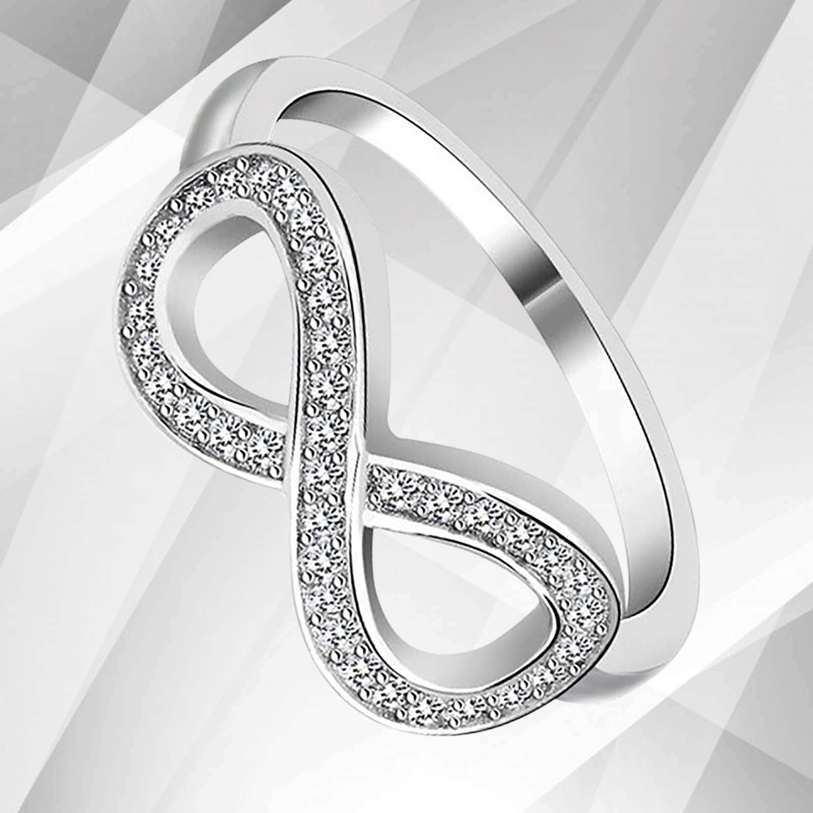 0.35Ct Round-Cut Infinity Engagement Ring featuring 30 top CZ diamonds set in 18K white gold, showcasing a stunning micro pave design.