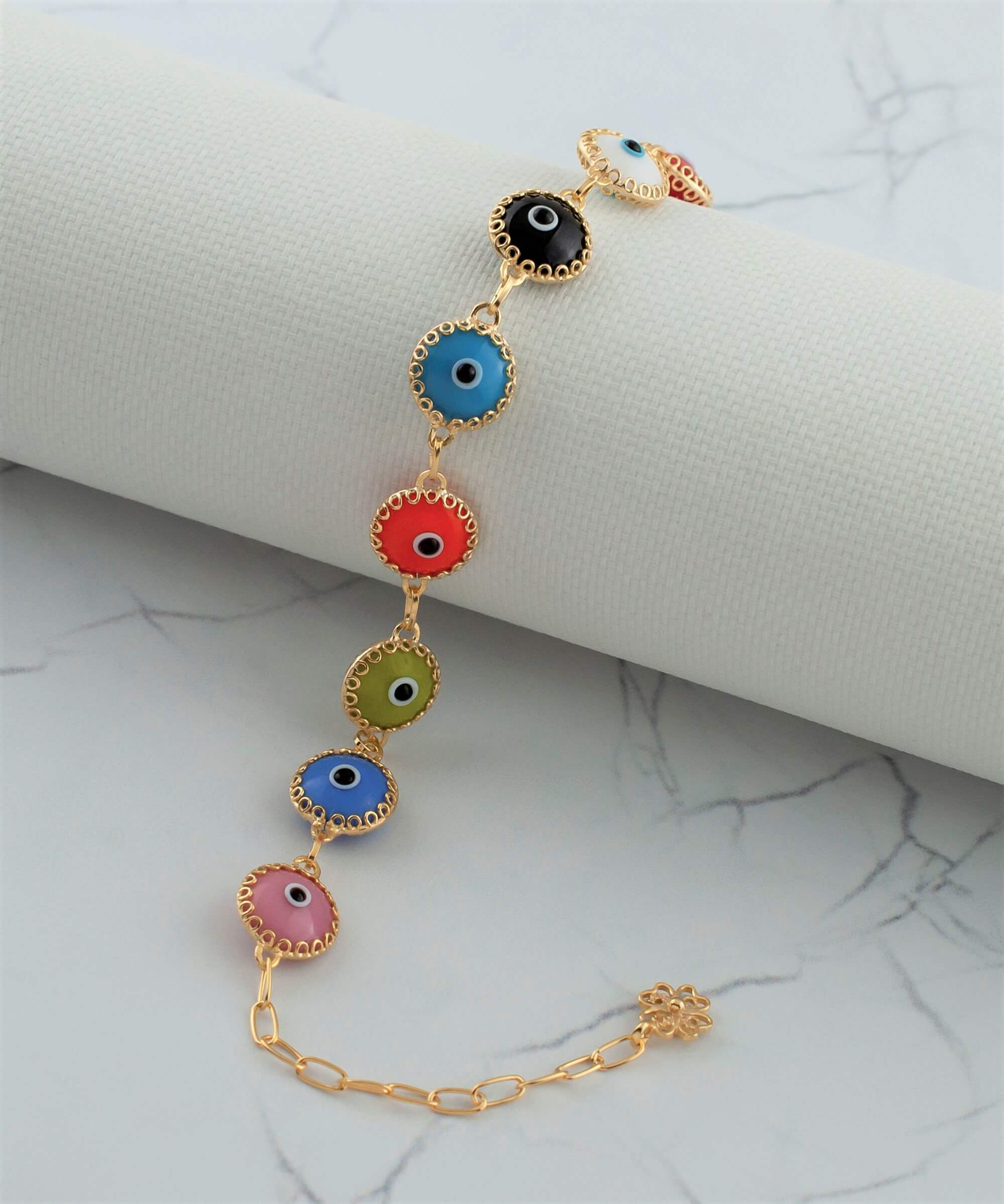 A stylish gold plated silver link bracelet featuring 10 multicolor evil eye beads, designed for women, showcasing intricate craftsmanship.