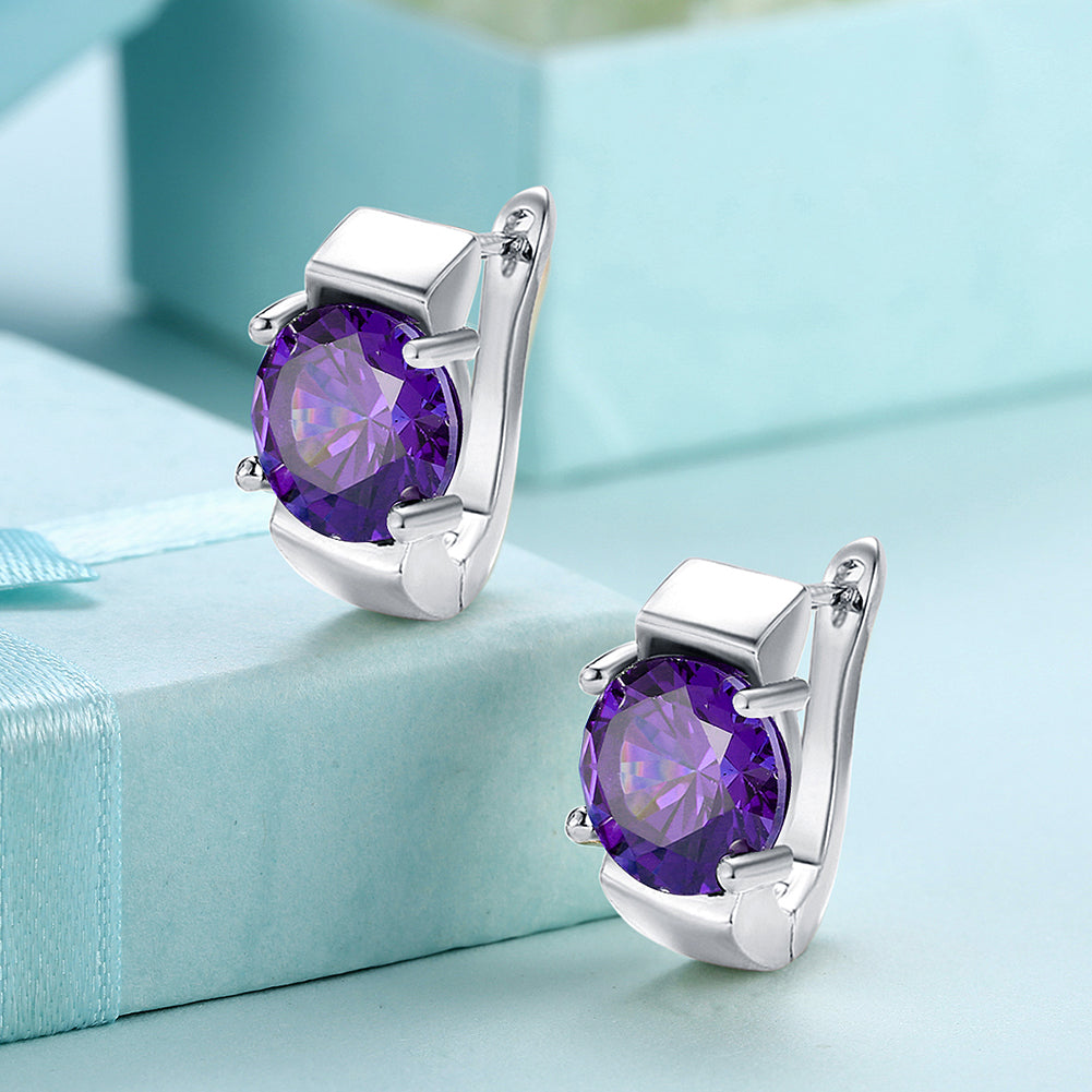 Elegant 1.00 Ct Amethyst Round Cut Huggie Earring in 18K White Gold Plated, showcasing a vibrant purple gemstone and luxurious design.