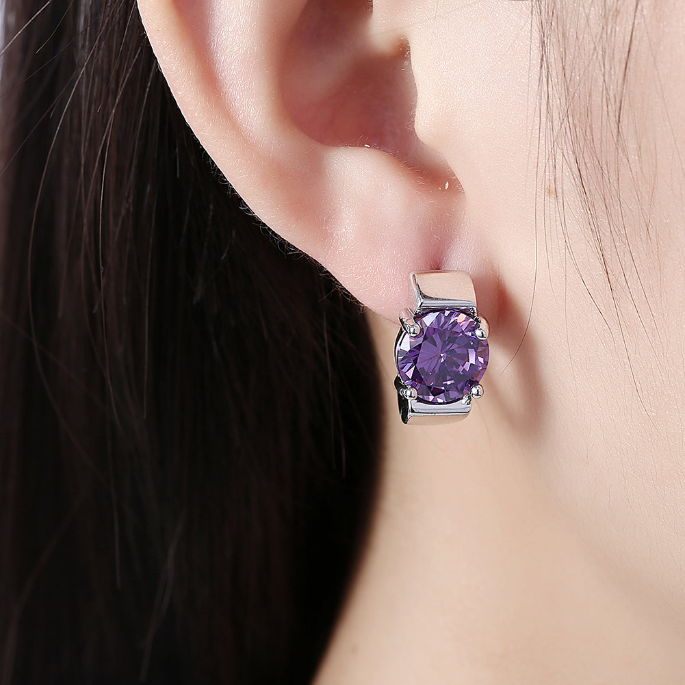 Elegant 1.00 Ct Amethyst Round Cut Huggie Earring in 18K White Gold Plated, showcasing a vibrant purple gemstone and luxurious design.