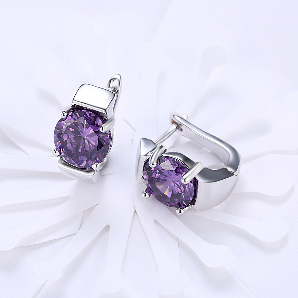 Elegant 1.00 Ct Amethyst Round Cut Huggie Earring in 18K White Gold Plated, showcasing a vibrant purple gemstone and luxurious design.