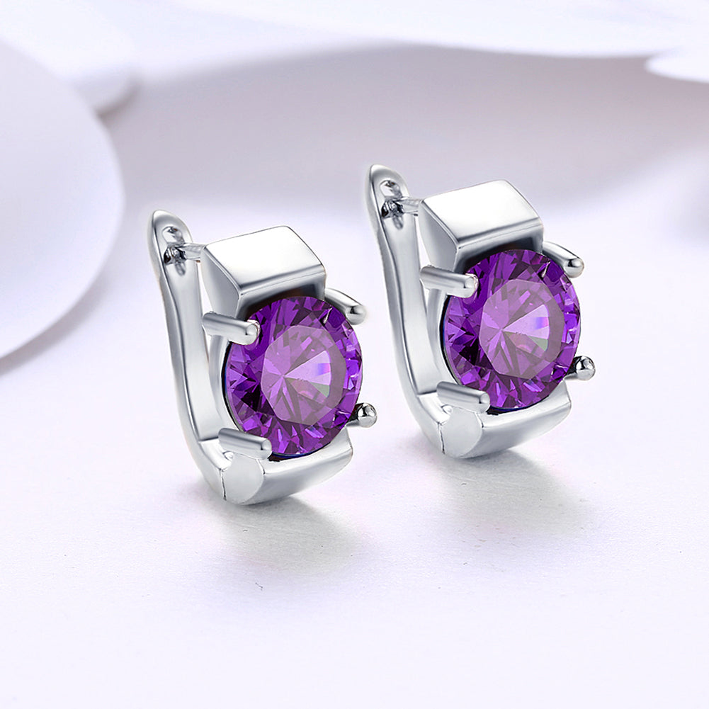 Elegant 1.00 Ct Amethyst Round Cut Huggie Earring in 18K White Gold Plated, showcasing a vibrant purple gemstone and luxurious design.