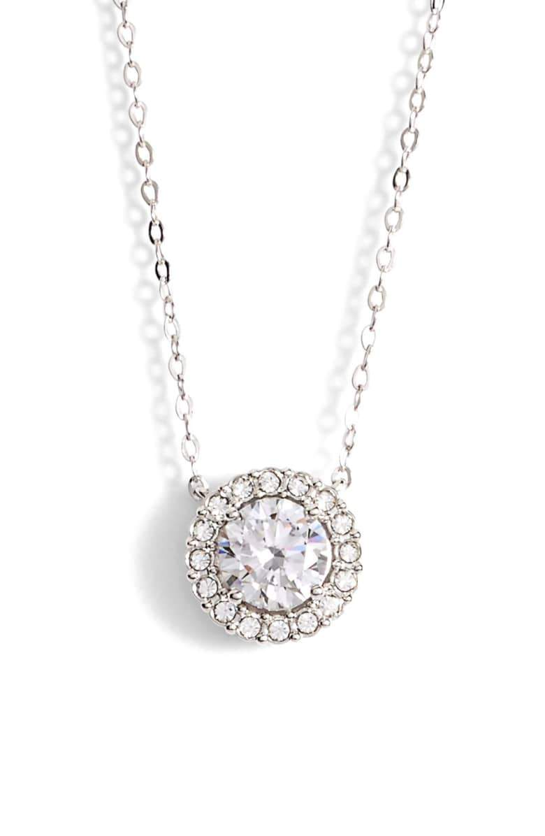 Elegant 1.00 CT Crystal Halo Disc Necklace in 18K White Gold Plated, featuring a sparkling crystal surrounded by a halo design.