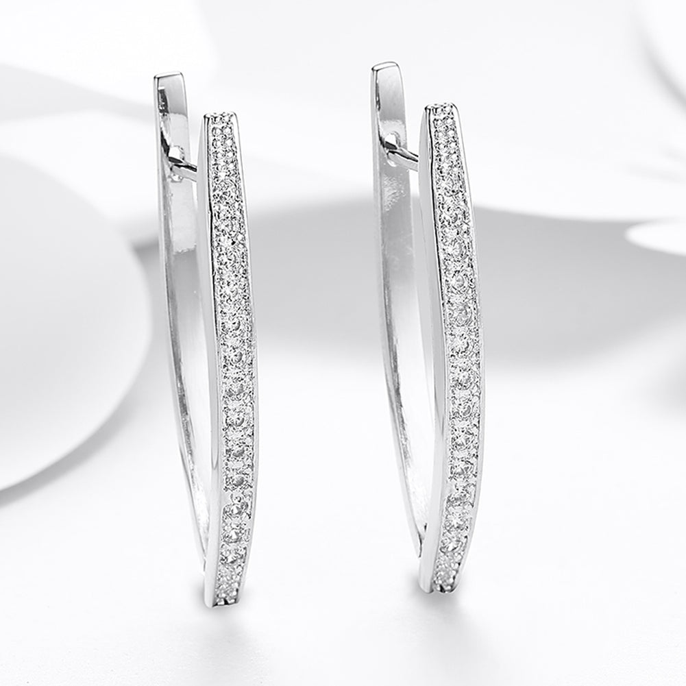 Elegant 1.00 CT Dangling Pave Teardrop Earrings in 14K White Gold, featuring sparkling pave crystals and a lightweight design.