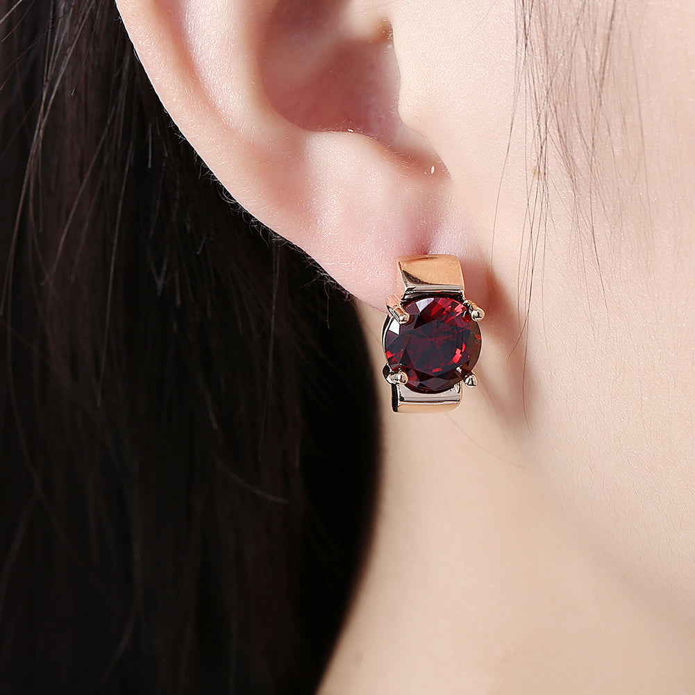 Elegant 1.00 Ct Ruby Round Cut Huggie Earring in 18K Gold Plated, showcasing its vibrant ruby and luxurious gold finish.