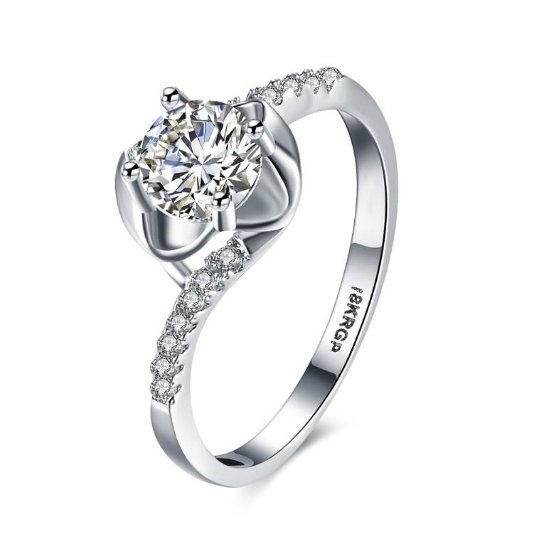 Elegant 1.00 CTTW Engagement Cut Floral White Crystal Pav'e Ring in white gold, featuring sparkling crystals in a floral design.