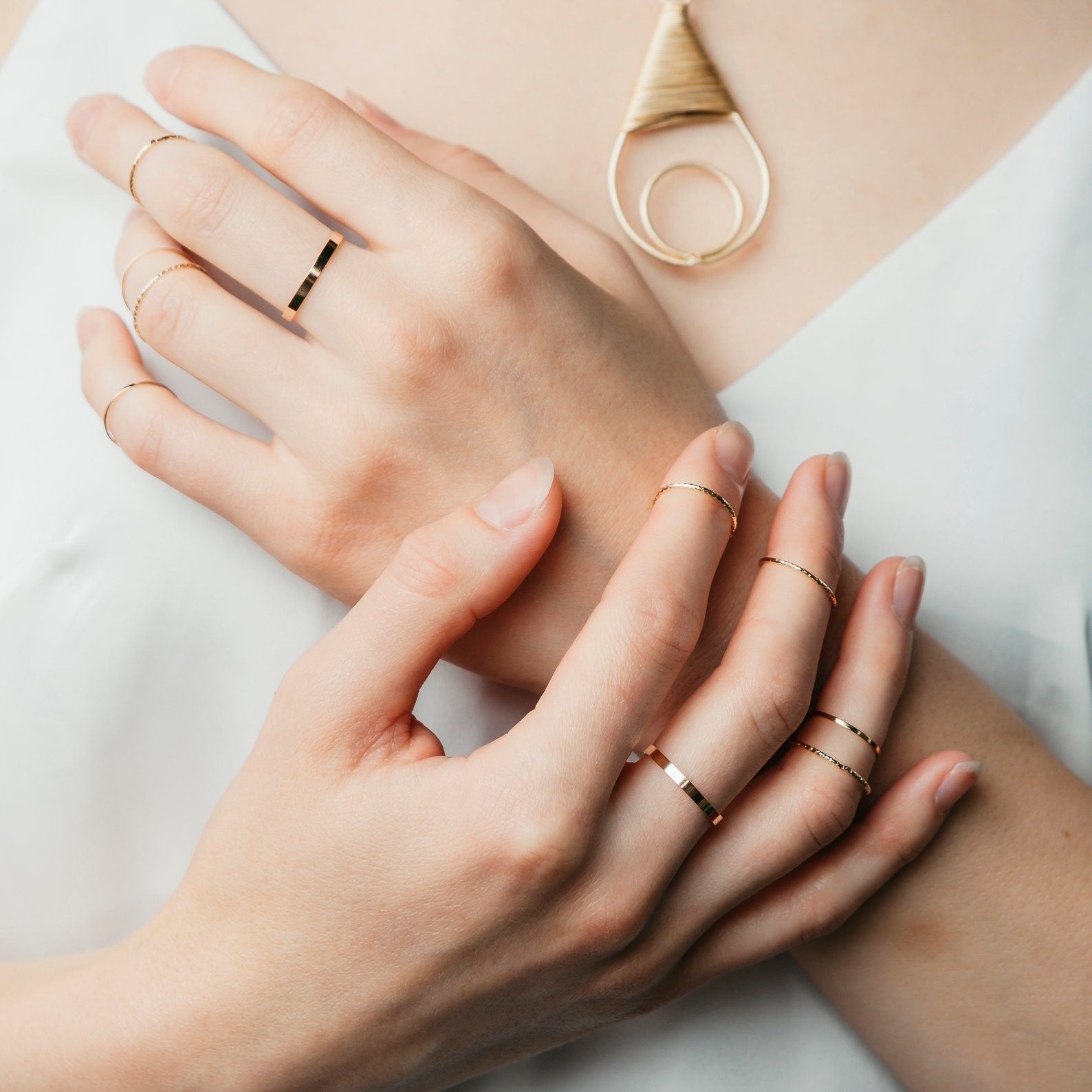 10 Piece Slim Silver Gold Stackable Bohemian Midi Tribal Beach Ring set displayed elegantly, showcasing various designs in silver and gold.