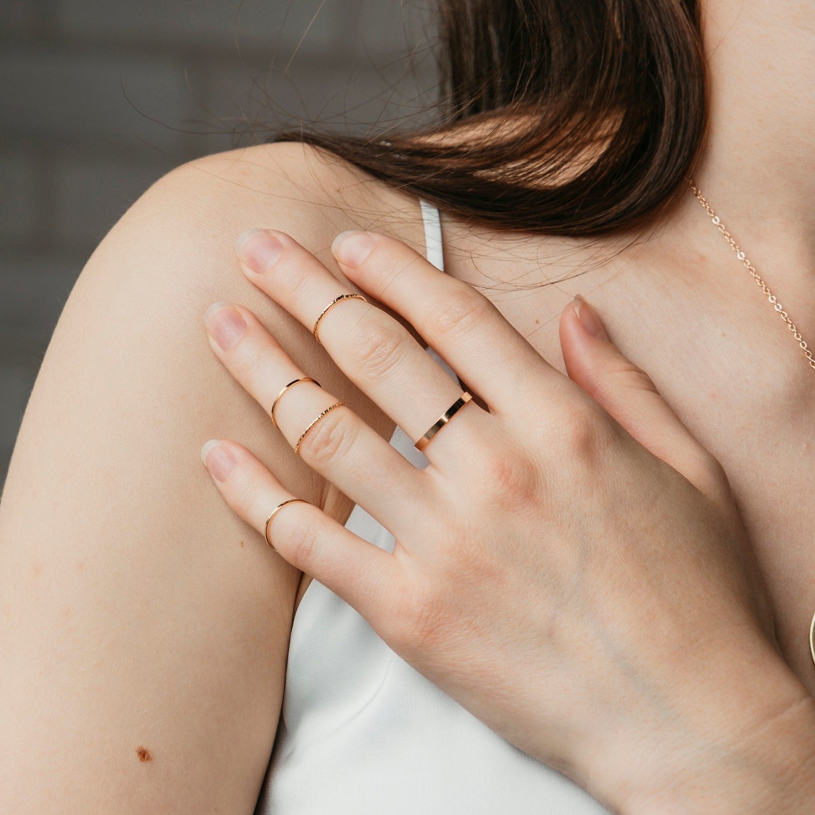 10 Piece Slim Silver Gold Stackable Bohemian Midi Tribal Beach Ring set displayed elegantly, showcasing various designs in silver and gold.