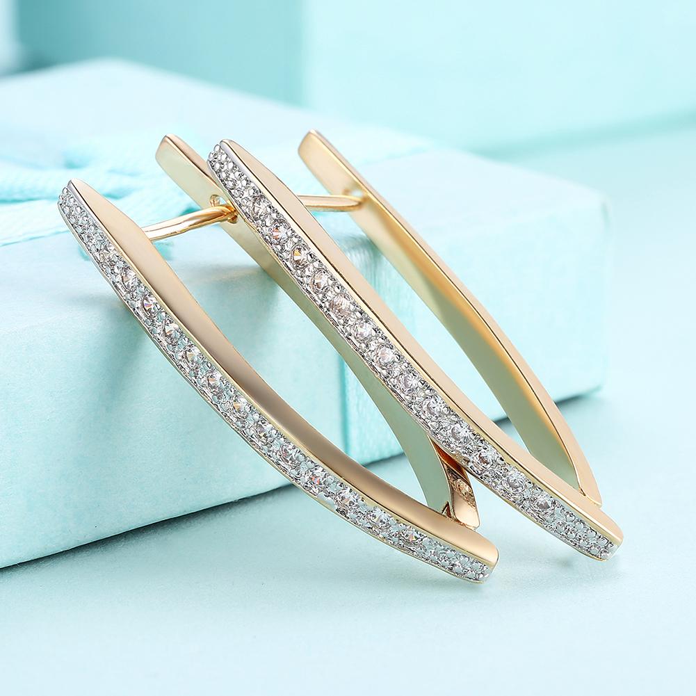 A luxurious 5-piece jewelry set featuring a 10Ct Tennis Bracelet, Halo Earrings, and a Necklace adorned with sparkling Austrian crystals, elegantly displayed in a gift box.