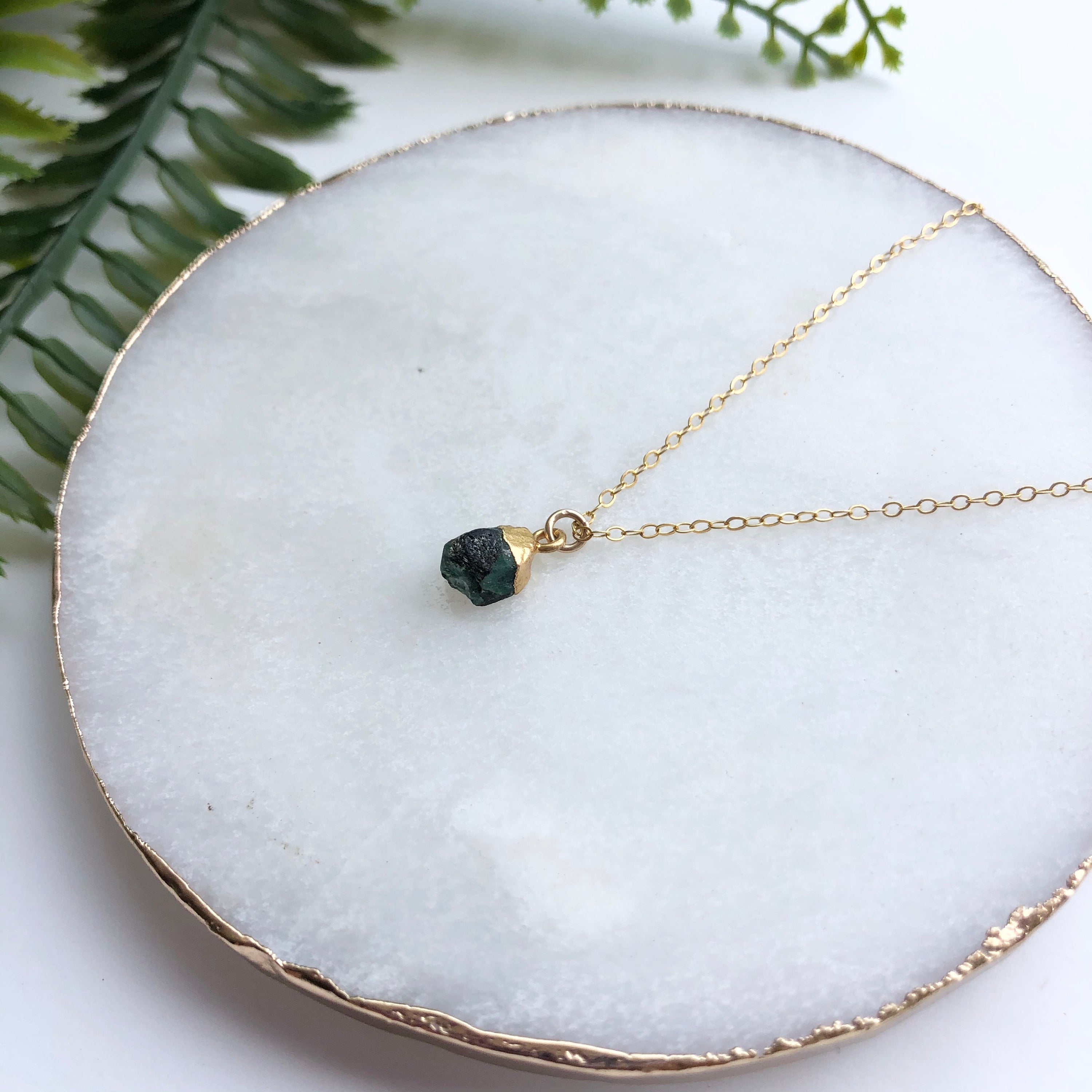 A beautiful 14K gold filled rough nugget necklace showcasing unique, natural nuggets on a delicate chain.