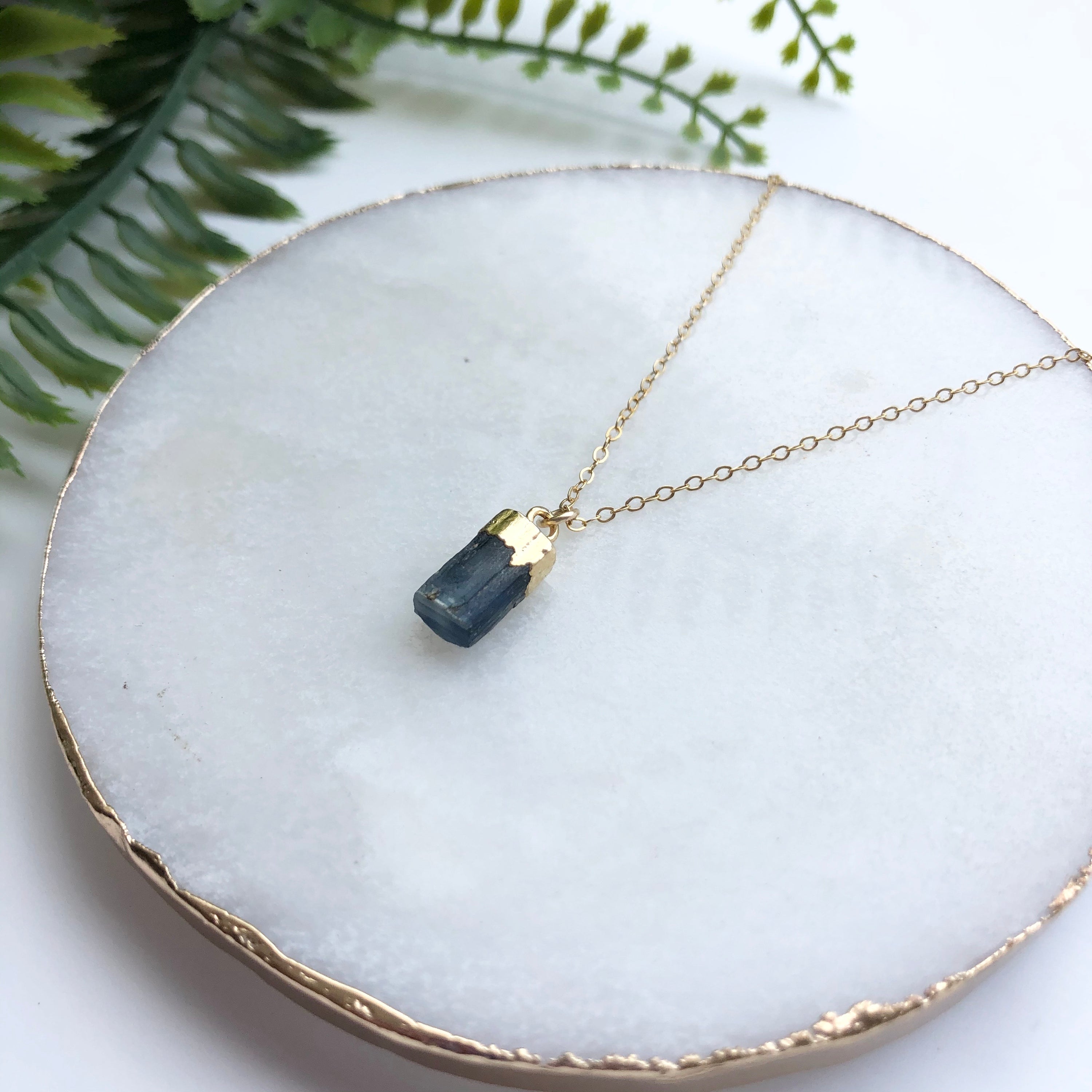 A beautiful 14K gold filled rough nugget necklace showcasing unique, natural nuggets on a delicate chain.