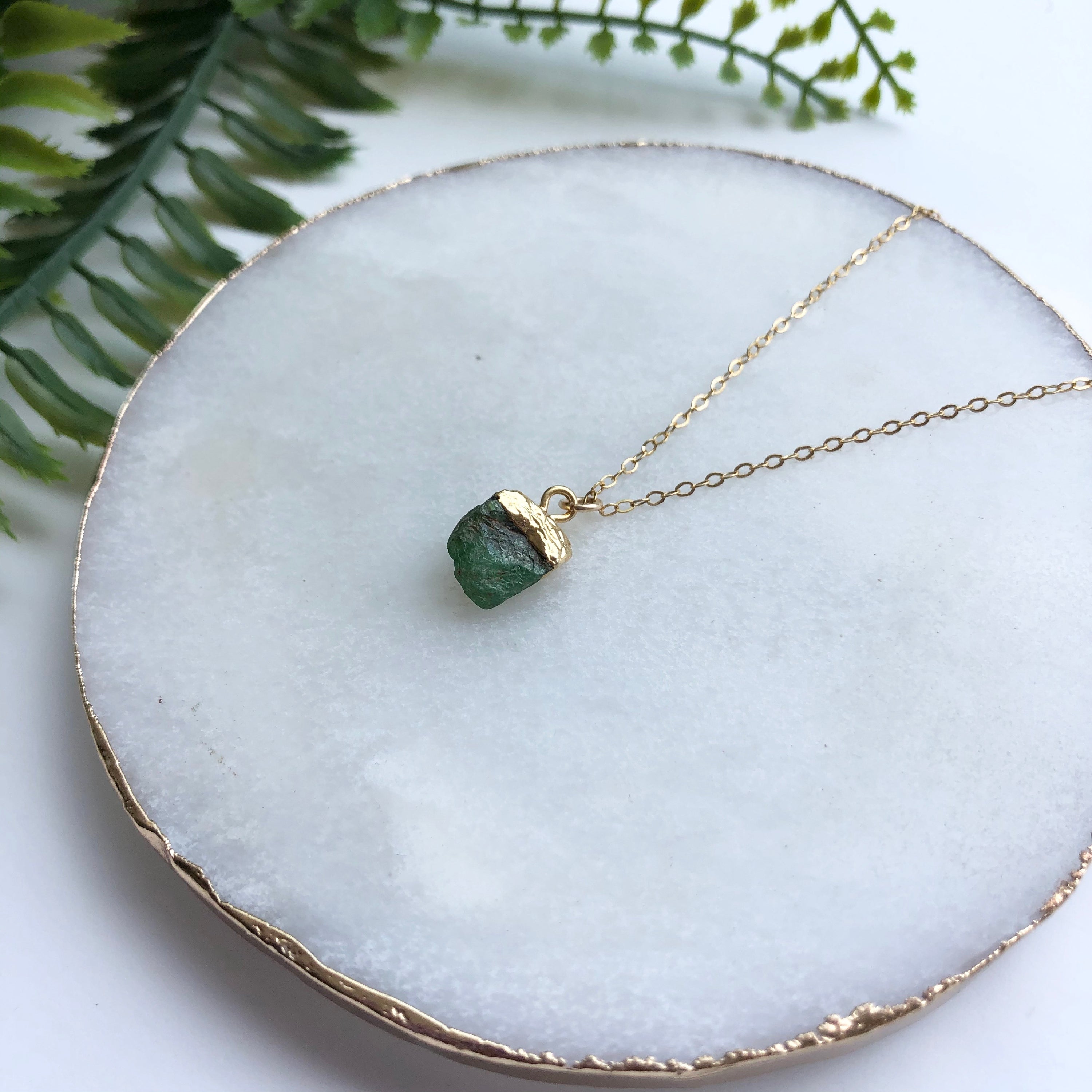 A beautiful 14K gold filled rough nugget necklace showcasing unique, natural nuggets on a delicate chain.