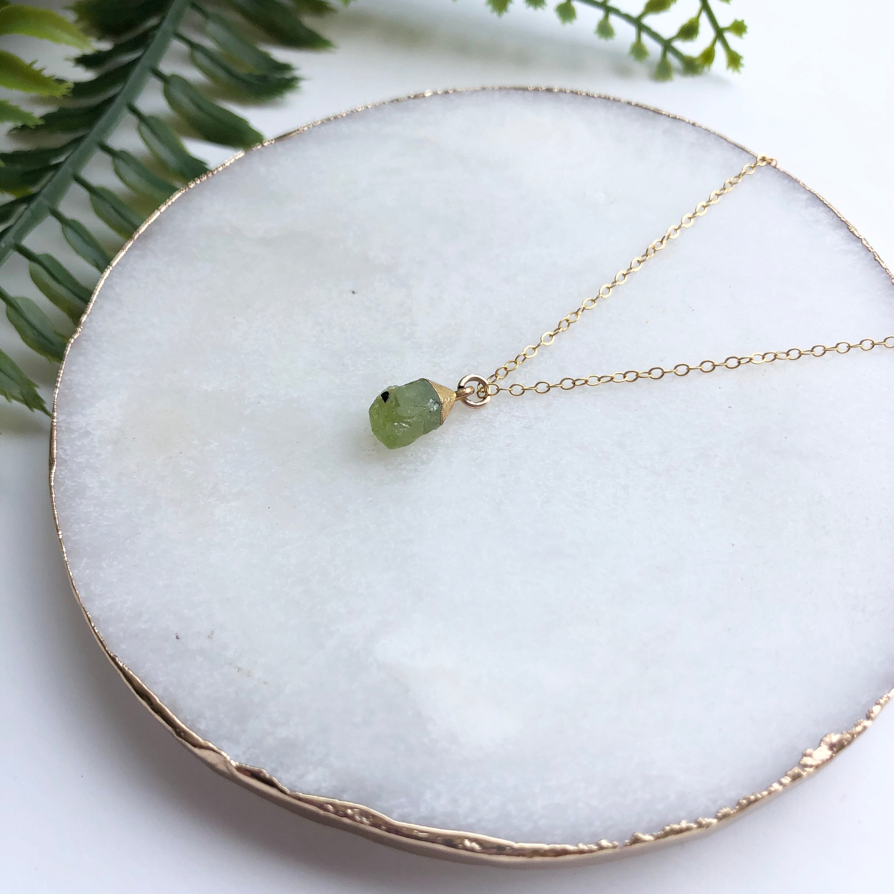 A beautiful 14K gold filled rough nugget necklace showcasing unique, natural nuggets on a delicate chain.