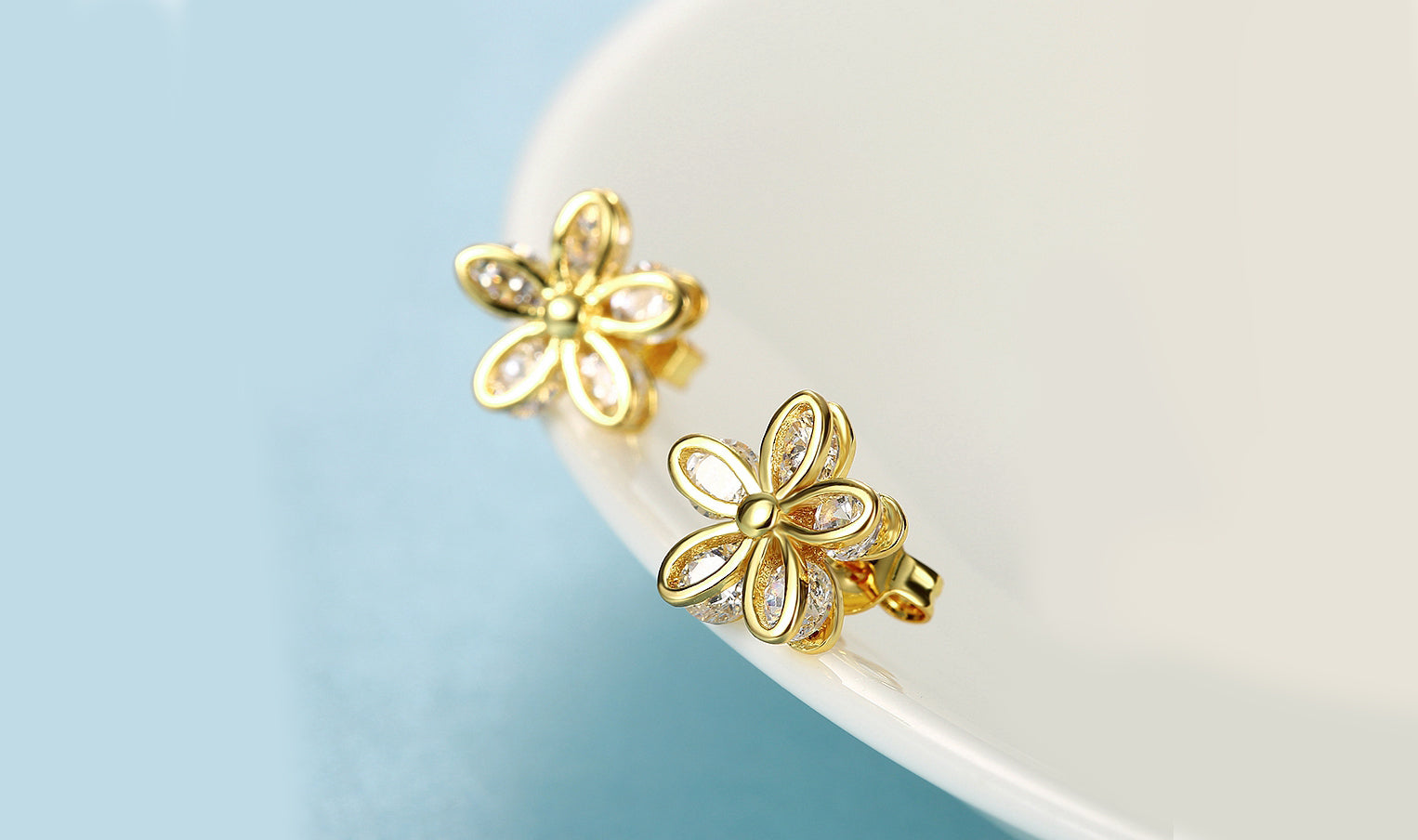 Elegant 14K Gold Plated White Elements Pav'e Paisley Stud Earrings with intricate design and sparkling stones.